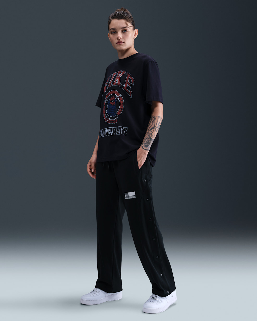 Nike Pantalón de básquetbol de apertura lateral de tejido Fleece - Mujer - Negro