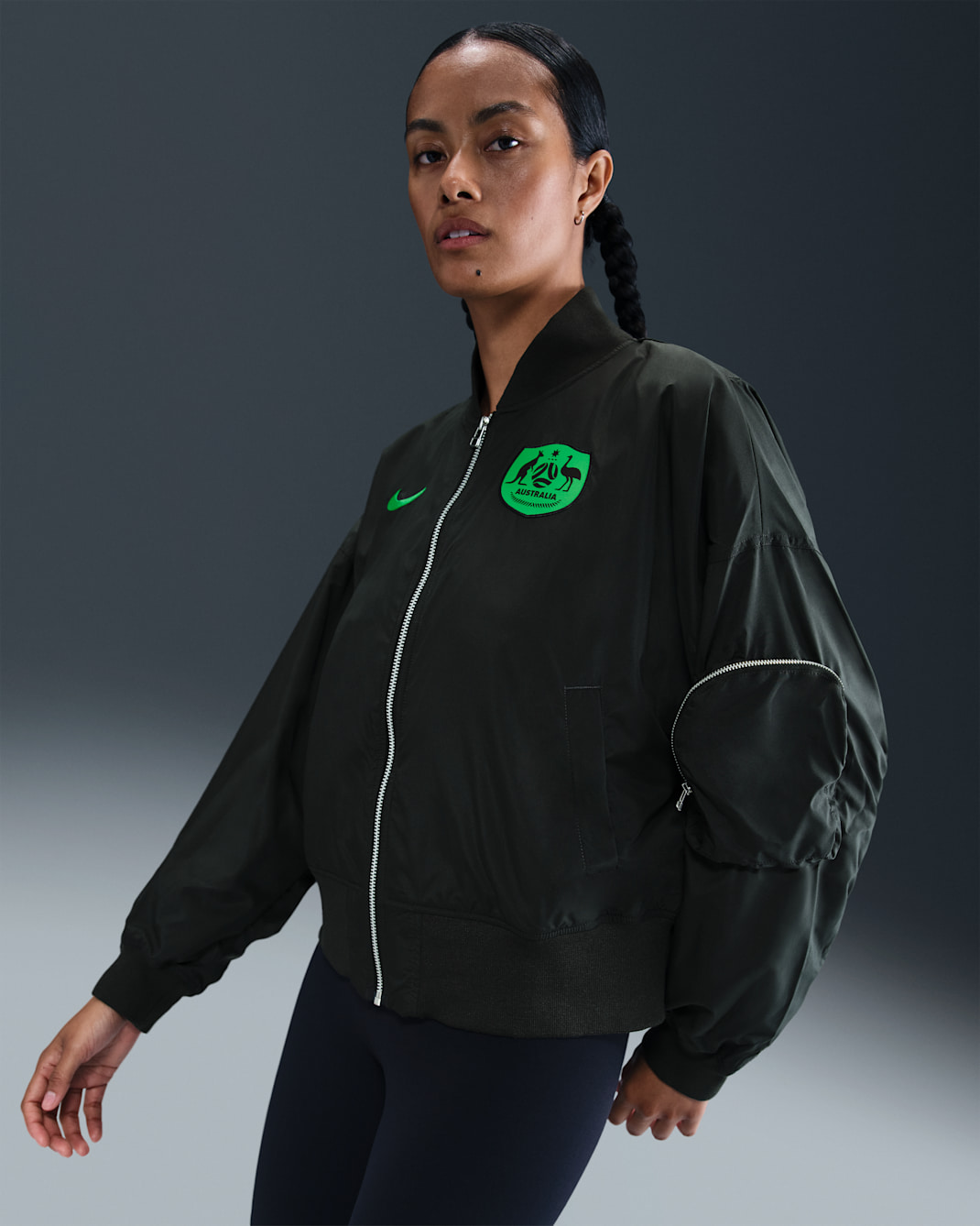 Australia Essential Women's Nike Football Oversized Bomber - Night Forest/Hyper Pink/Poison Green