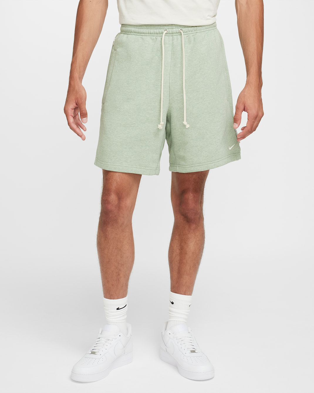 Shorts de básquetbol de tejido Fleece Dri-FIT de 20 cm para hombre Nike Standard Issue - Horizonte jade/Jaspeado/Marfil pálido