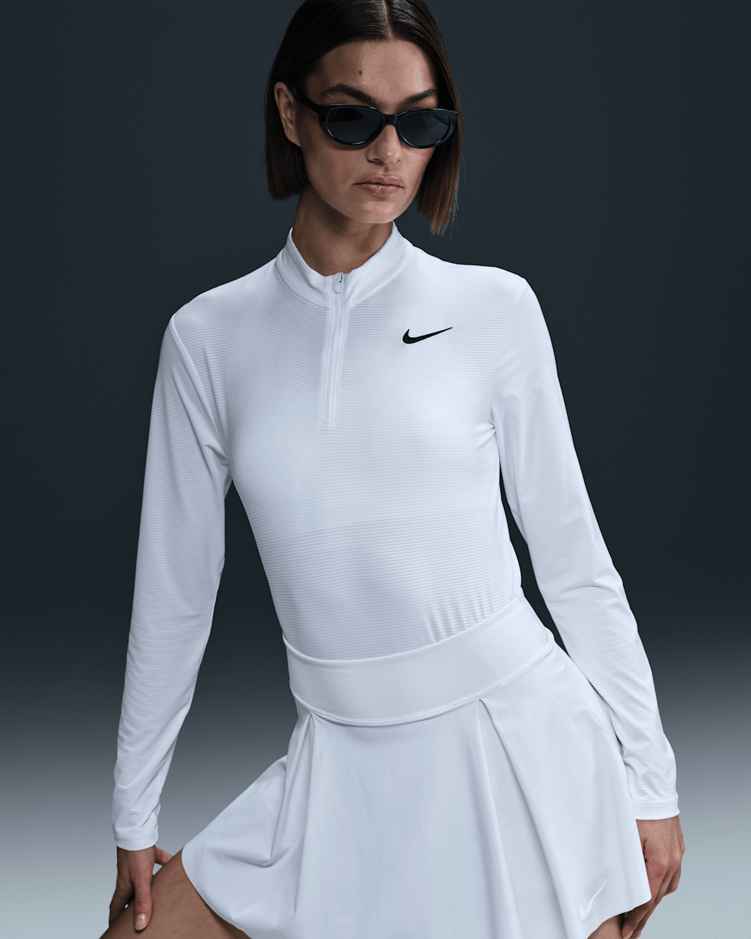 Playera de golf Dri-FIT con cierre de 1/4 y protección contra los rayos UV para mujer Nike Victory - Blanco/Negro