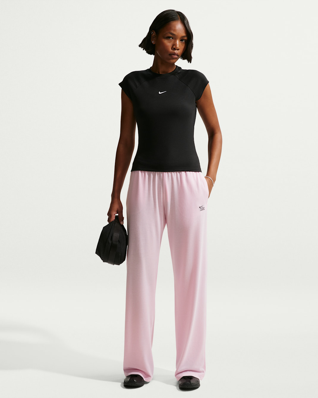 Pants de dobladillo abierto ligeros de tiro medio para mujer Nike Sportswear Chill Knit - Espuma rosa/Gris humo oscuro