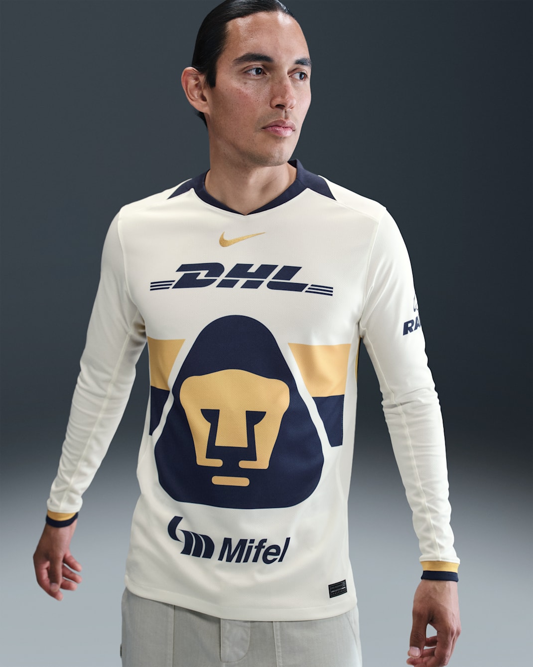 Jersey de fútbol de manga larga Nike Dri-FIT Replica de los Pumas UNAM local 2025/26 Stadium para hombre - Vela/Oro club