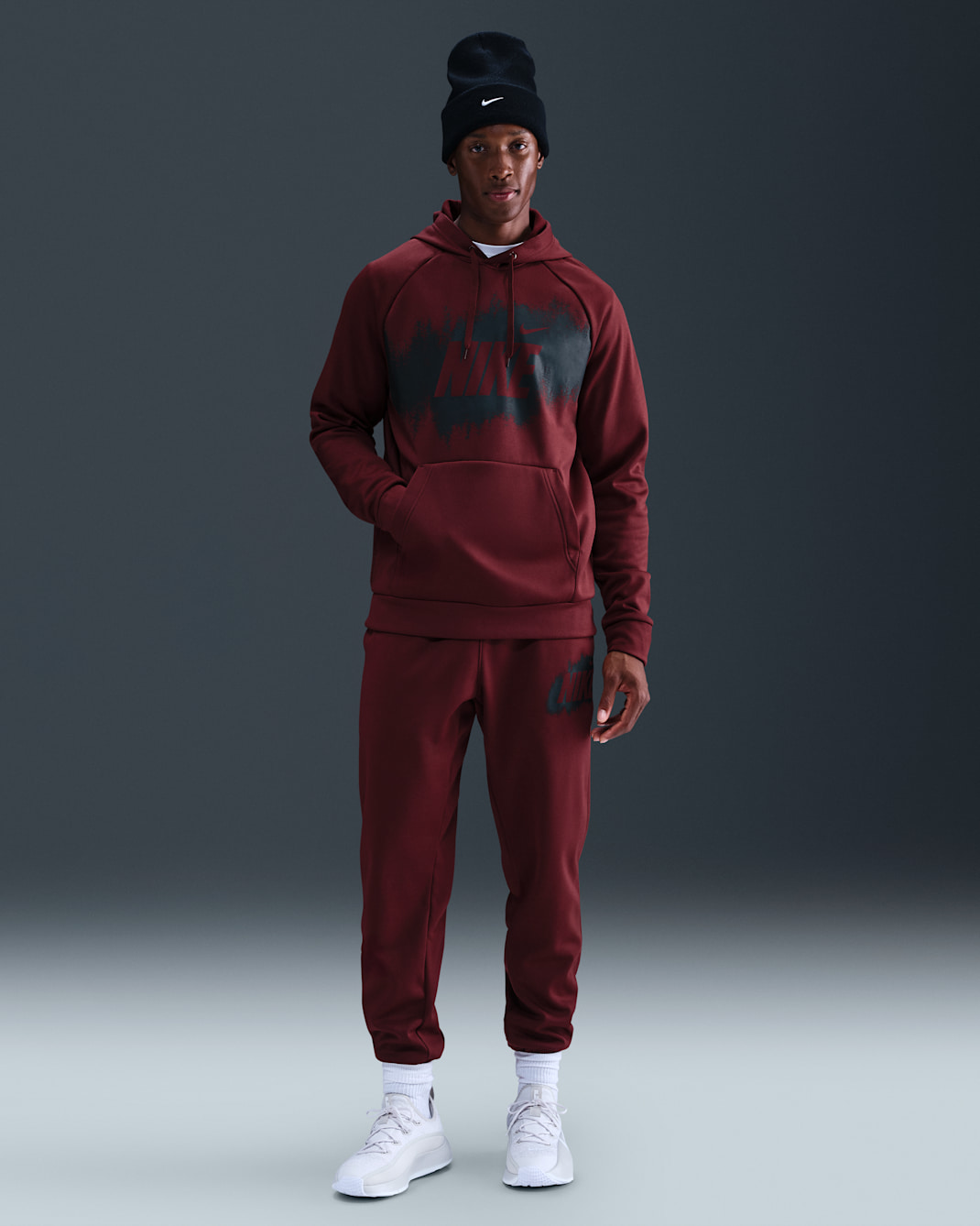 Męskie joggery z dzianiny Nike Therma-FIT - Dark Team Red