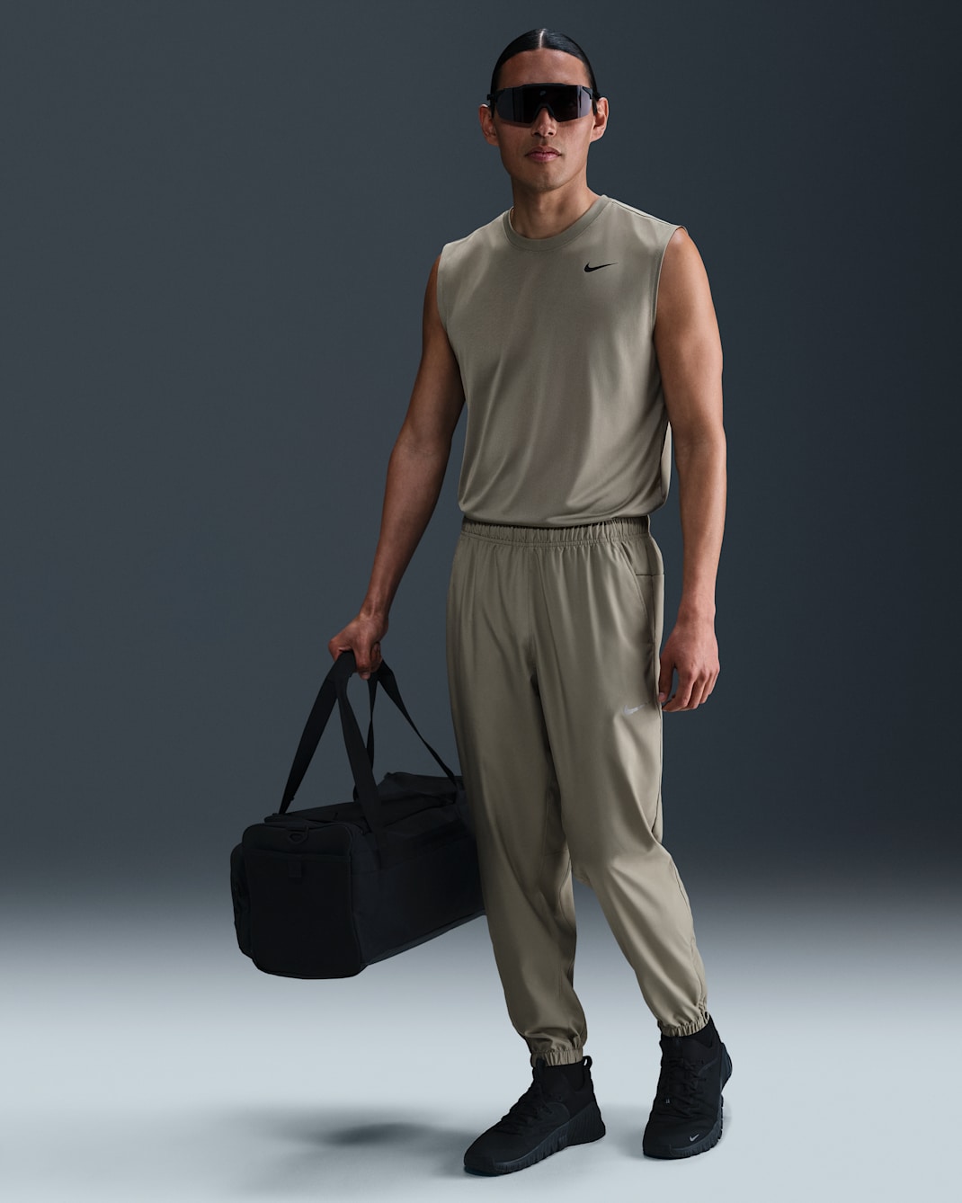 Nike Form Dri-FIT avsmalnet, allsidig herrebukse - Light Army/Svart