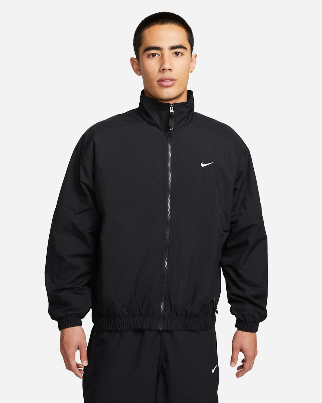 เสื้อแจ็คเก็ตวอร์มผู้ชาย Nike Sportswear Solo Swoosh - ดำ/ขาว