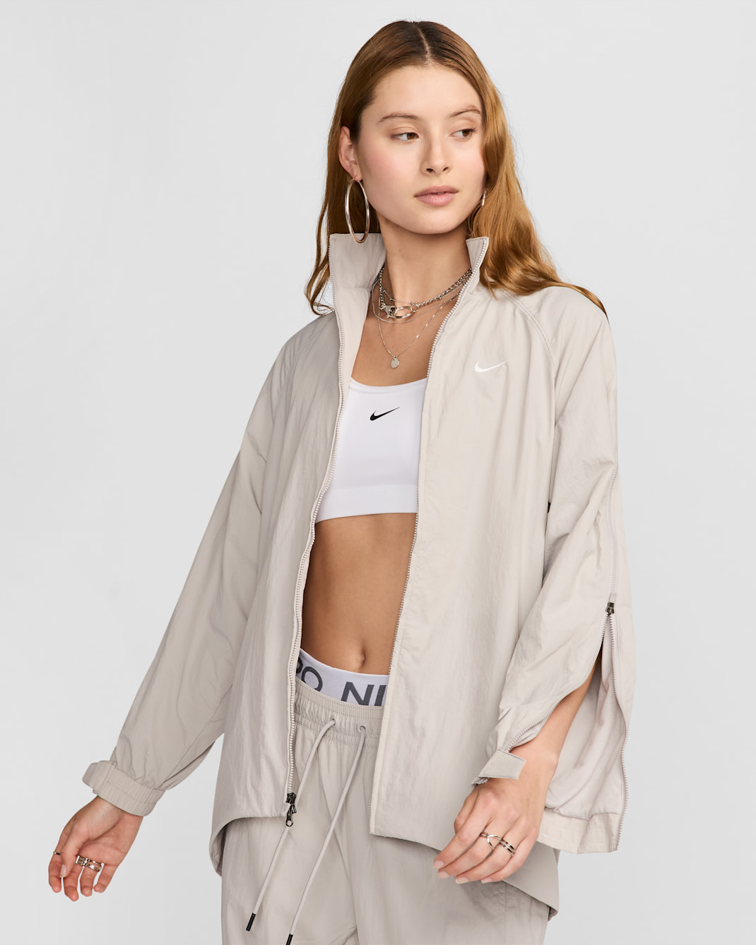 ナイキ スポーツウェア コレクション ウィメンズ オーバーサイズド レペル ジップ ジャケット - ライトアイアンオール/ホワイト