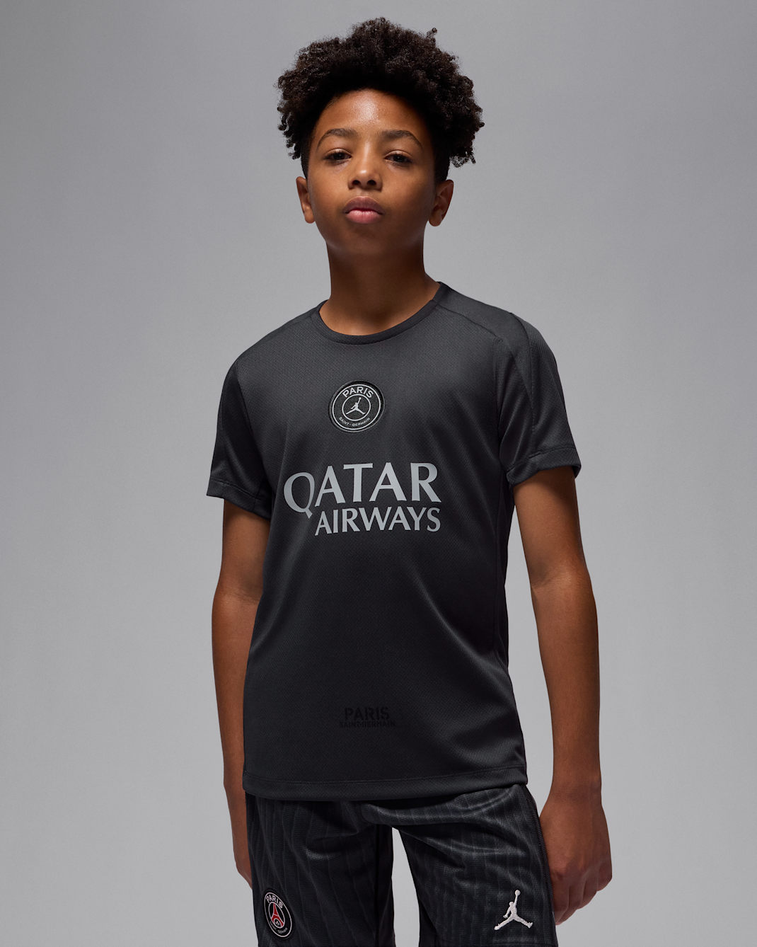 Paris Saint-Germain Strike Fourth Older Kids' Jordan Dri-FIT Football Short-Sleeve Top - Off-Noir/Off-Noir/Off-Noir/Particle Grey