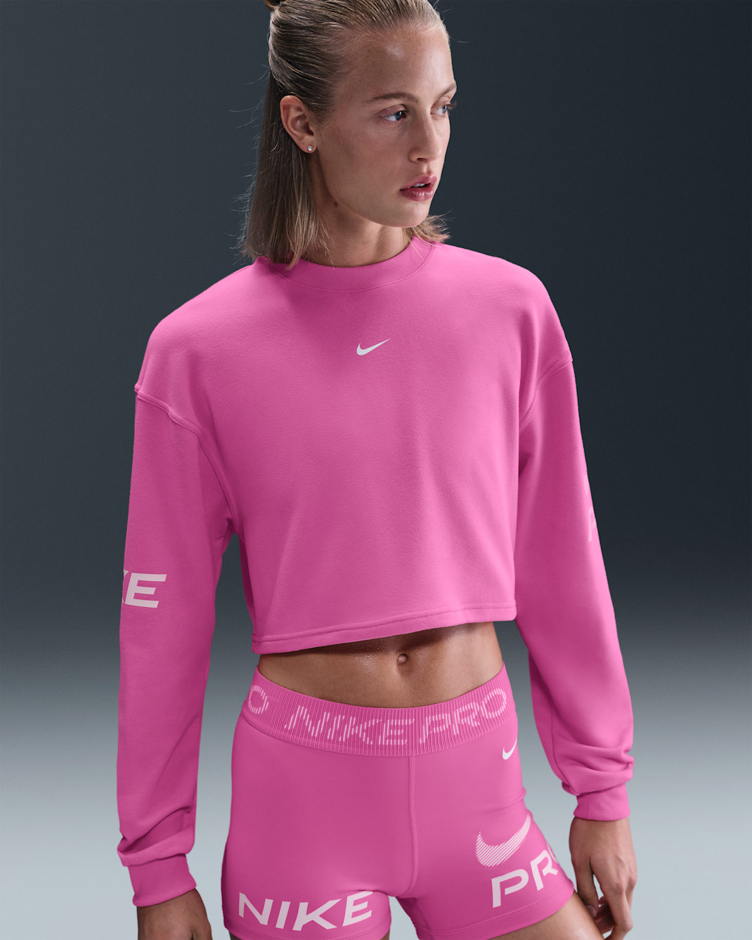 Nike Pro Women's Dri-FIT Loose Crew-Neck French Terry Sweatshirt - Playful Pink/Pink Foam/White