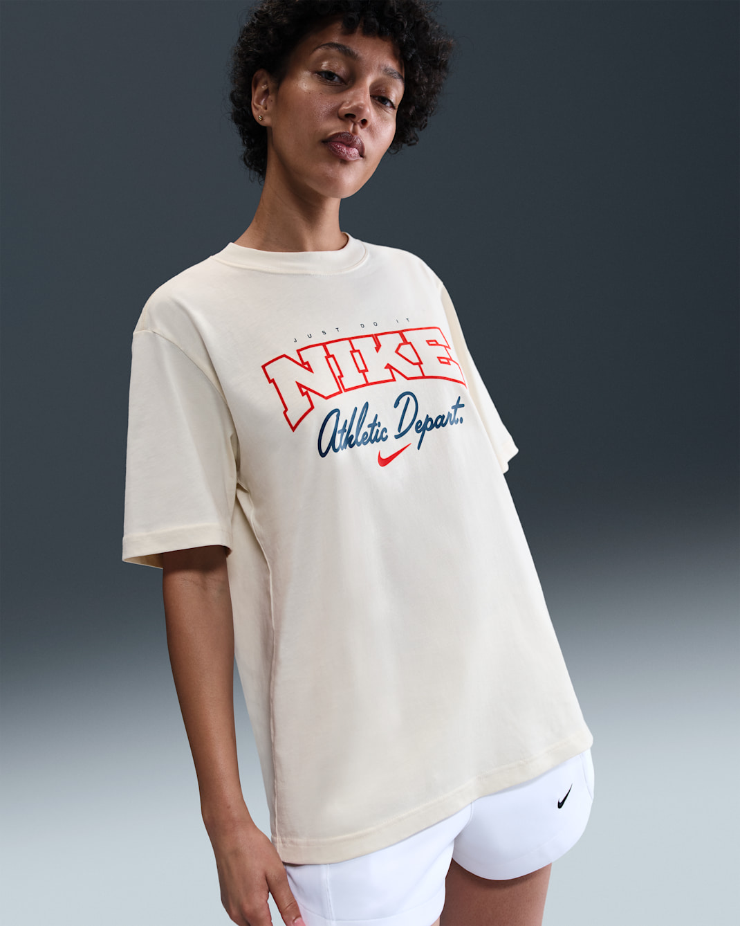Nike Sportswear Women's Loose Short-Sleeve Graphic T-Shirt - Pale Ivory