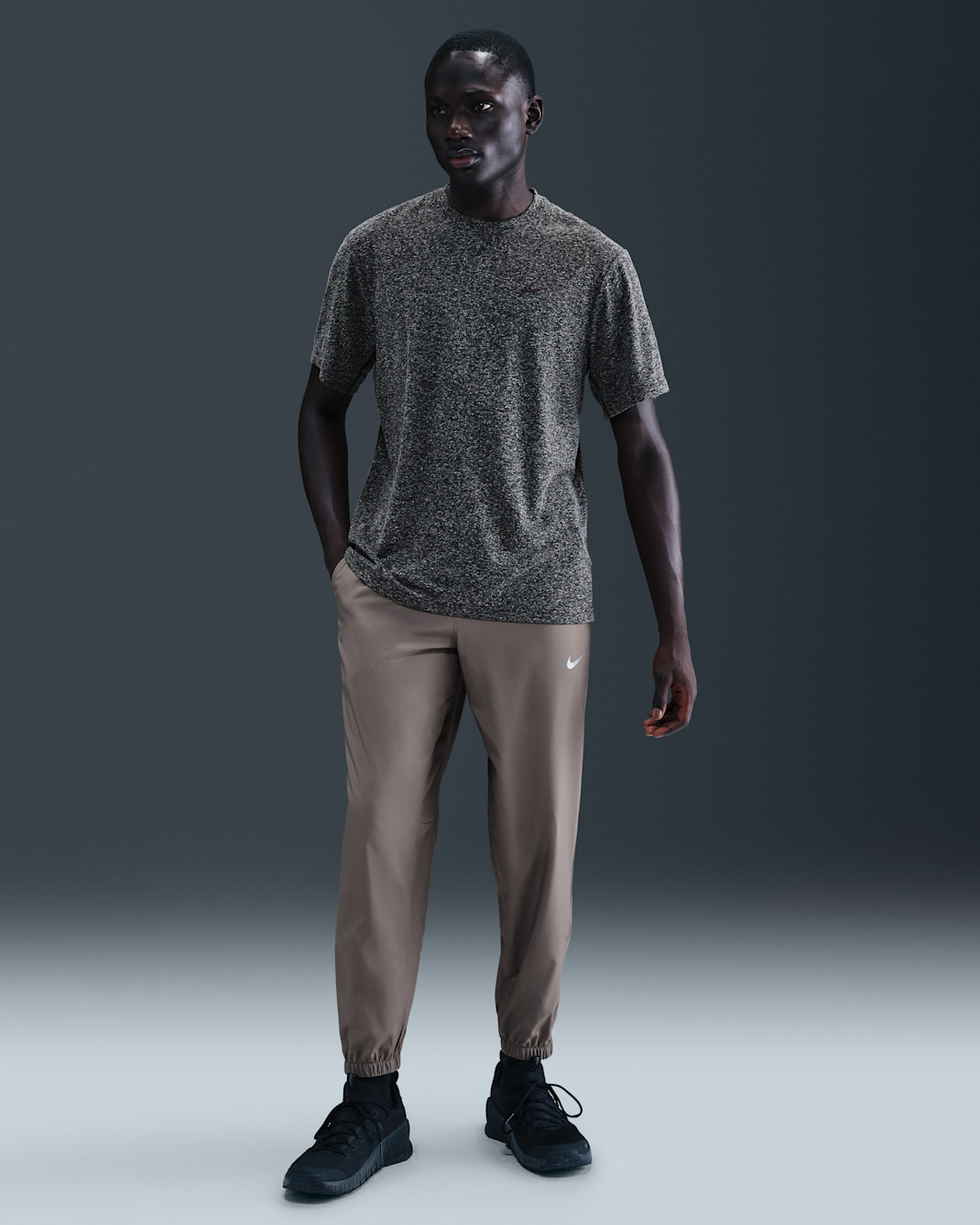 Nike Form Dri-FIT avsmalnet, allsidig herrebukse - Cave Stone/Svart