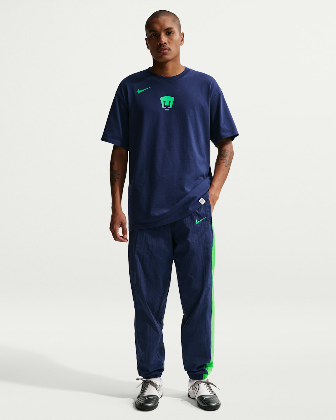 Pants deportivos de fútbol Nike Total 90 de tejido Woven para hombre Pumas UNAM Third - Azul vacío/Verde chispa claro/Verde impacto