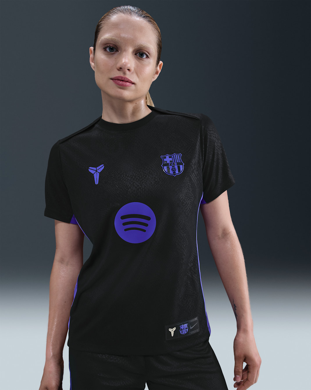 F.C. Barcelona Academy Pro Away Women's Kobe Dri-FIT Football Pre-Game Short-Sleeve Top - Black/Black/Persian Violet/Persian Violet
