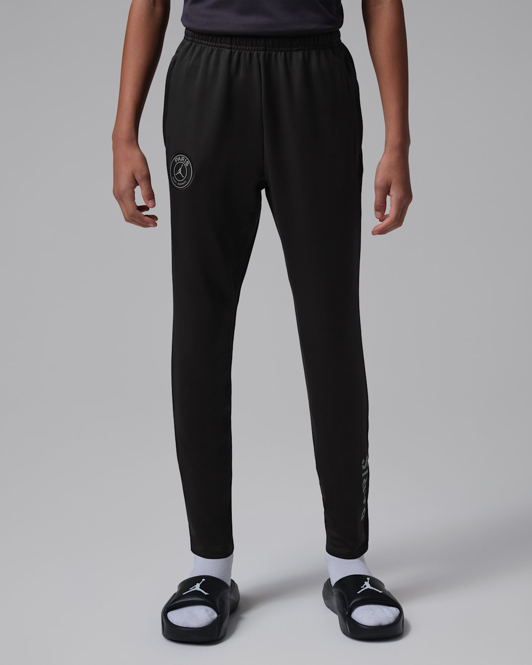 Paris Saint-Germain Strike (fjerdedrakt) Jordan Dri-FIT strikket fotballbukse til store barn - Off Noir/Particle Grey