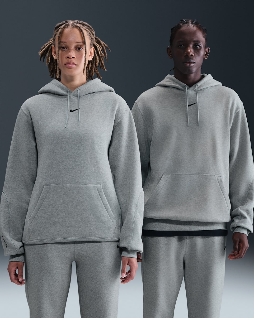 Mikina NOCTA Fleece CS 2 s kapucí - Dark Grey Heather/Matte Silver/Černá