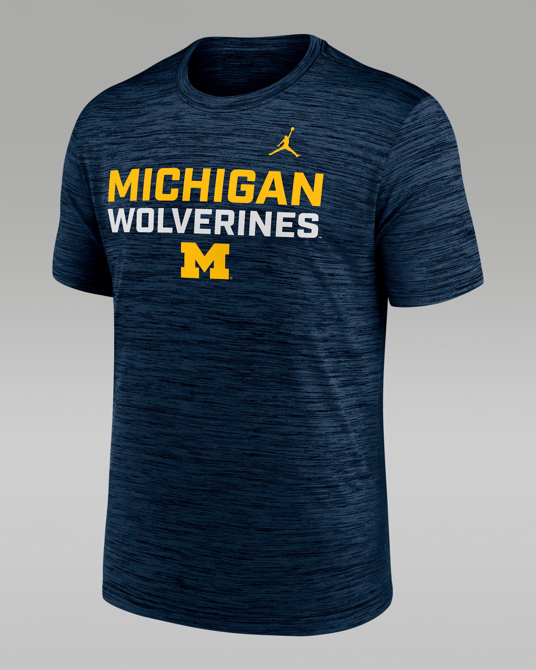 Playera universitaria Nike Dri-FIT para hombre Michigan Campus Center Stack Velocity - Azul marino