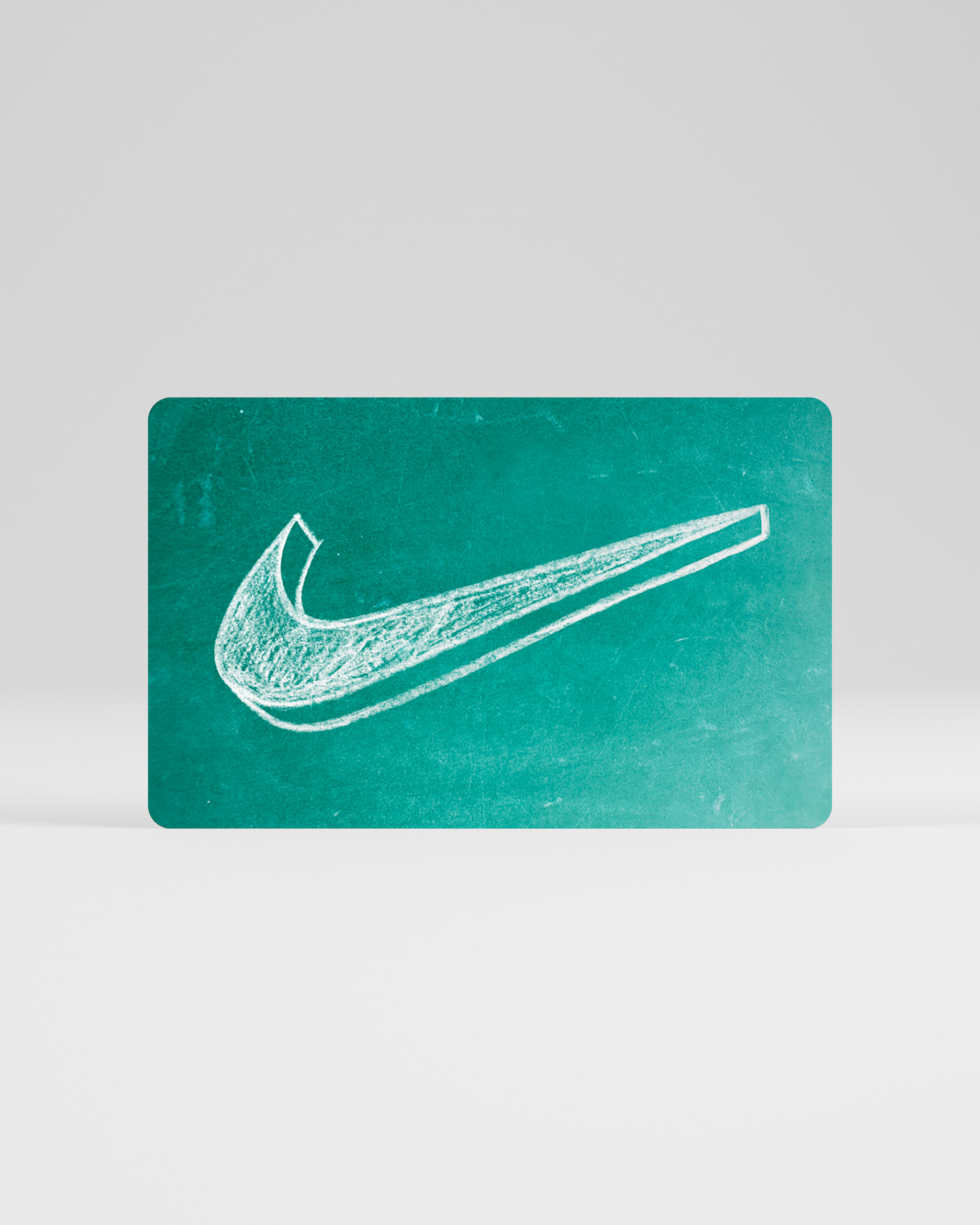 La tarjeta de regalo Nike se envía por correo en una minicaja de tenis Nike - Verde