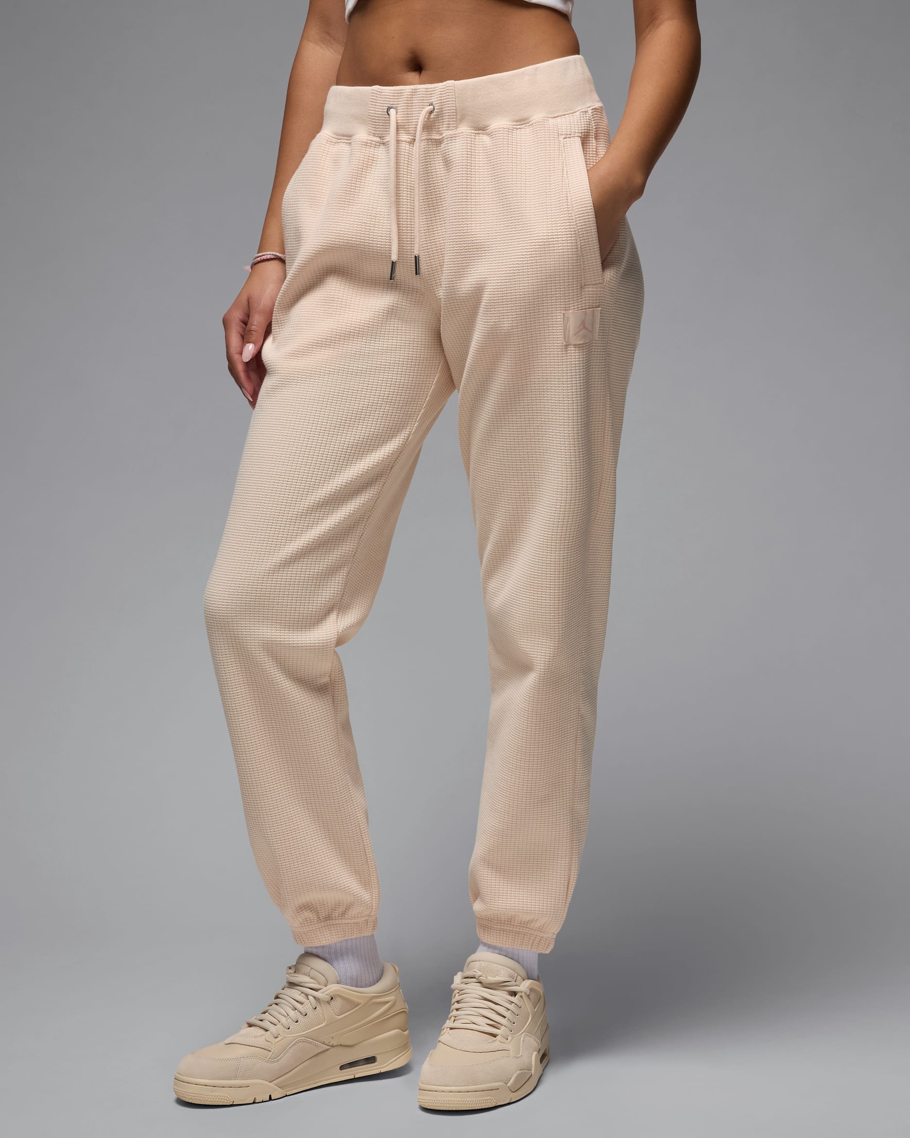 Pants tipo waffle para mujer Jordan Flight Fleece - Guayaba hielo