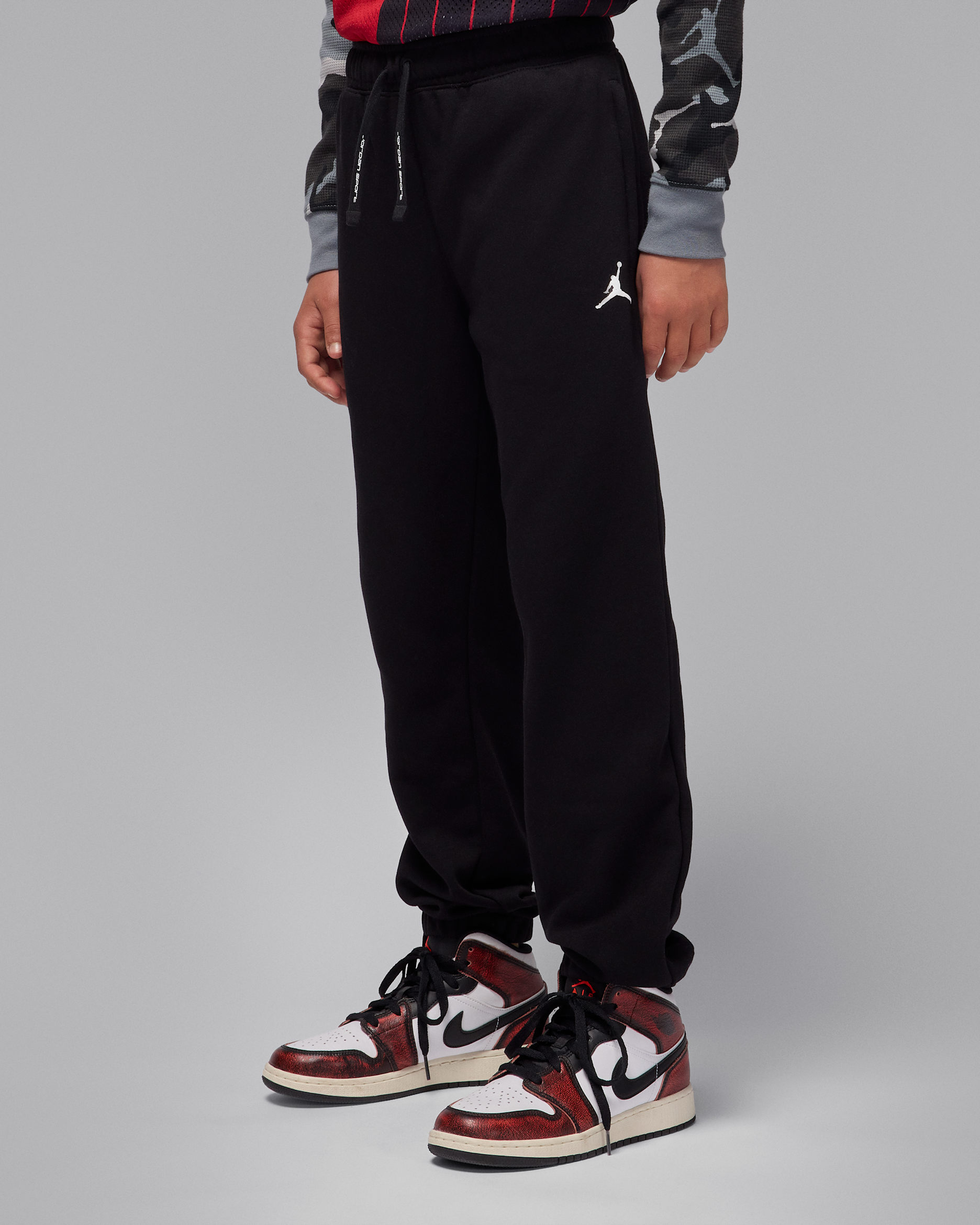 Calças Jordan Dri-FIT Sport Crossover Júnior - Preto