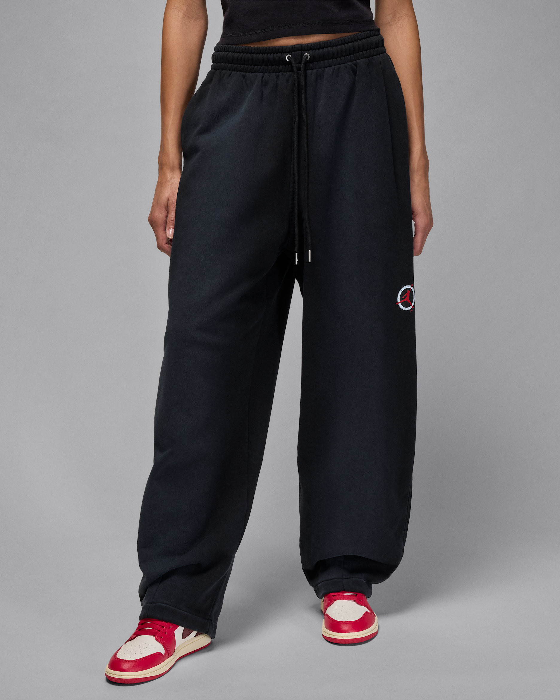 Rymliga byxor Jordan Flight Fleece för kvinnor - Svart