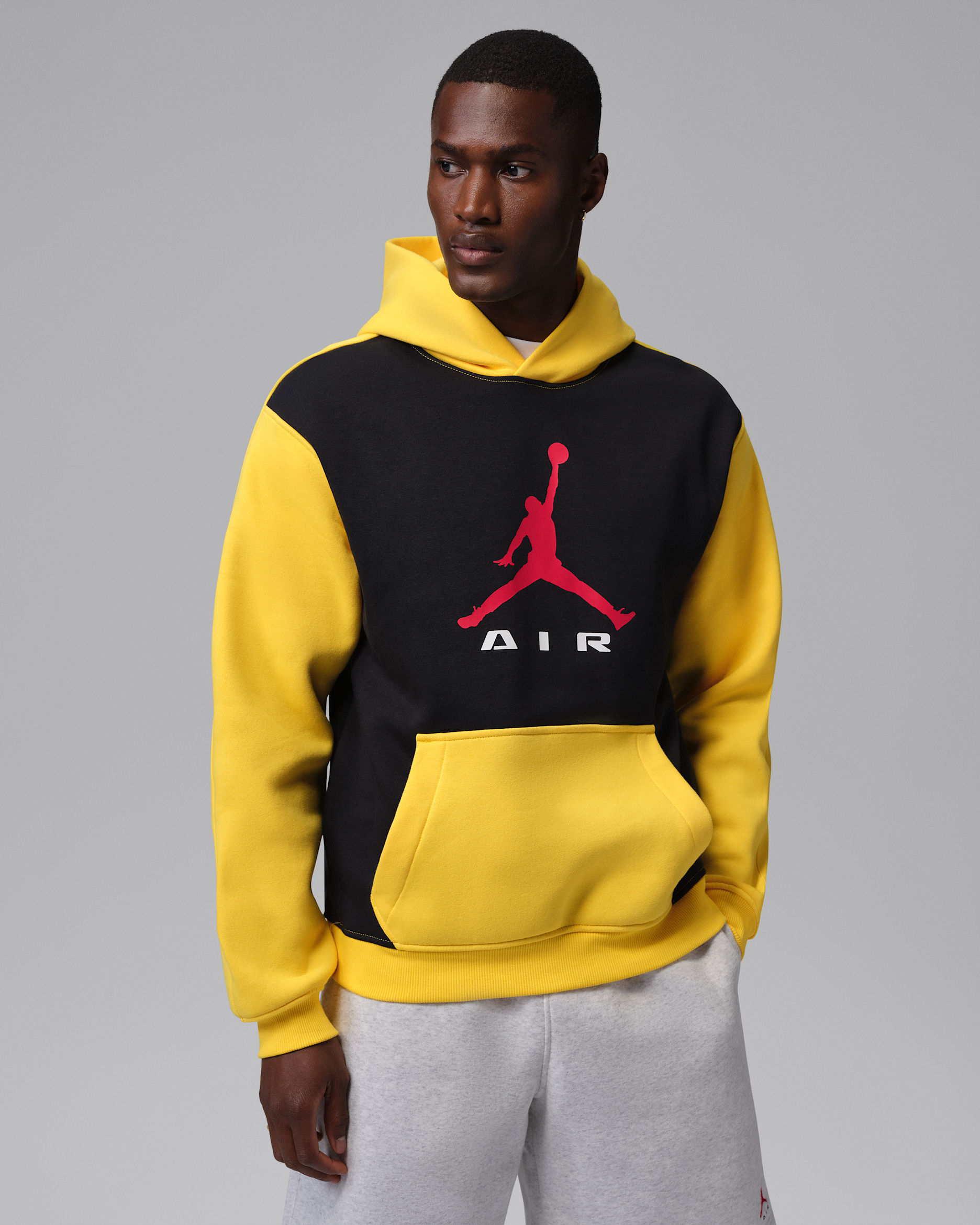 Jordan Brooklyn Men's Pullover Hoodie - Black/Tour Yellow/University Red