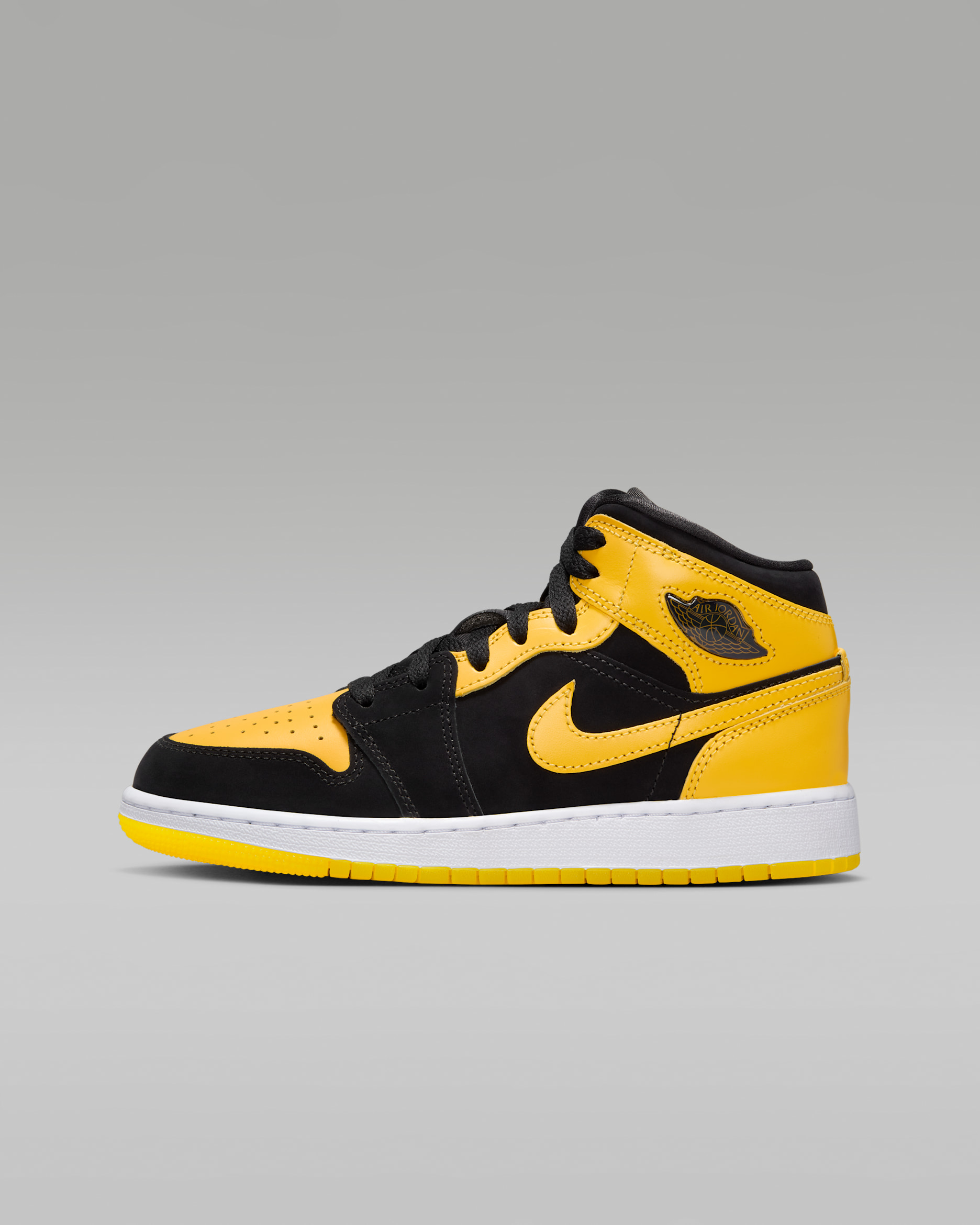 Tenis para niños grandes Air Jordan 1 Mid SE - Negro/Blanco/Amarillo universitario