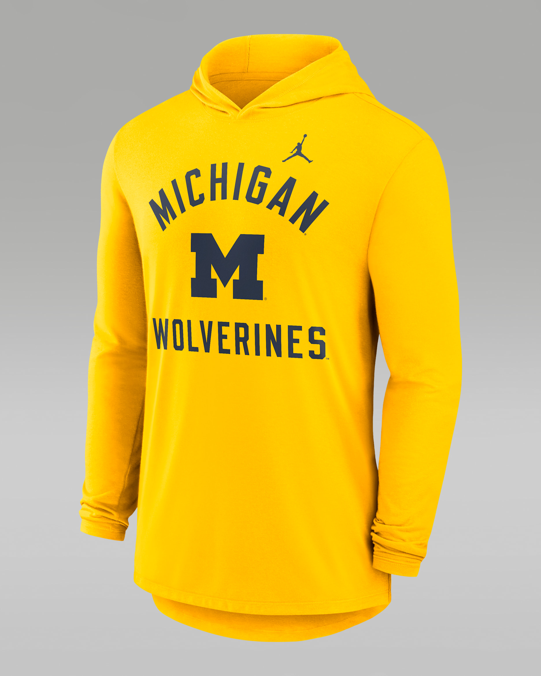 Playera de manga larga universitaria marca Jordan Dri-FIT con gorro para hombre Michigan Campus Arch - Amarillo maíz