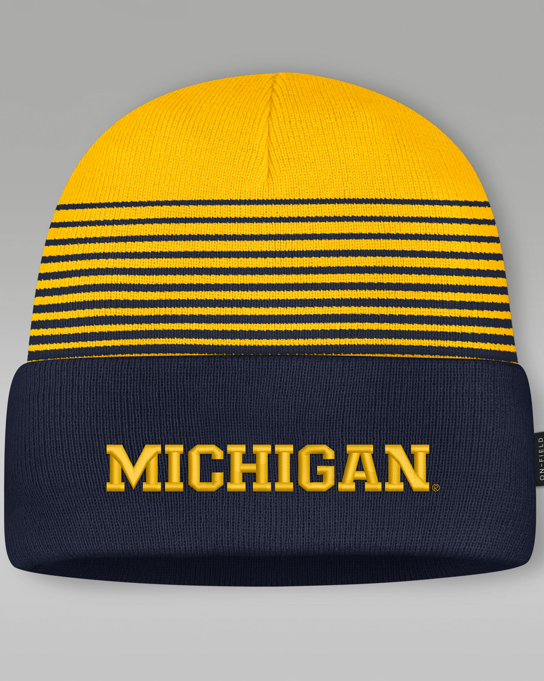 Michigan Sideline Utility Men's Jordan Brand College Cuffed Beanie - College Navy/Amarillo