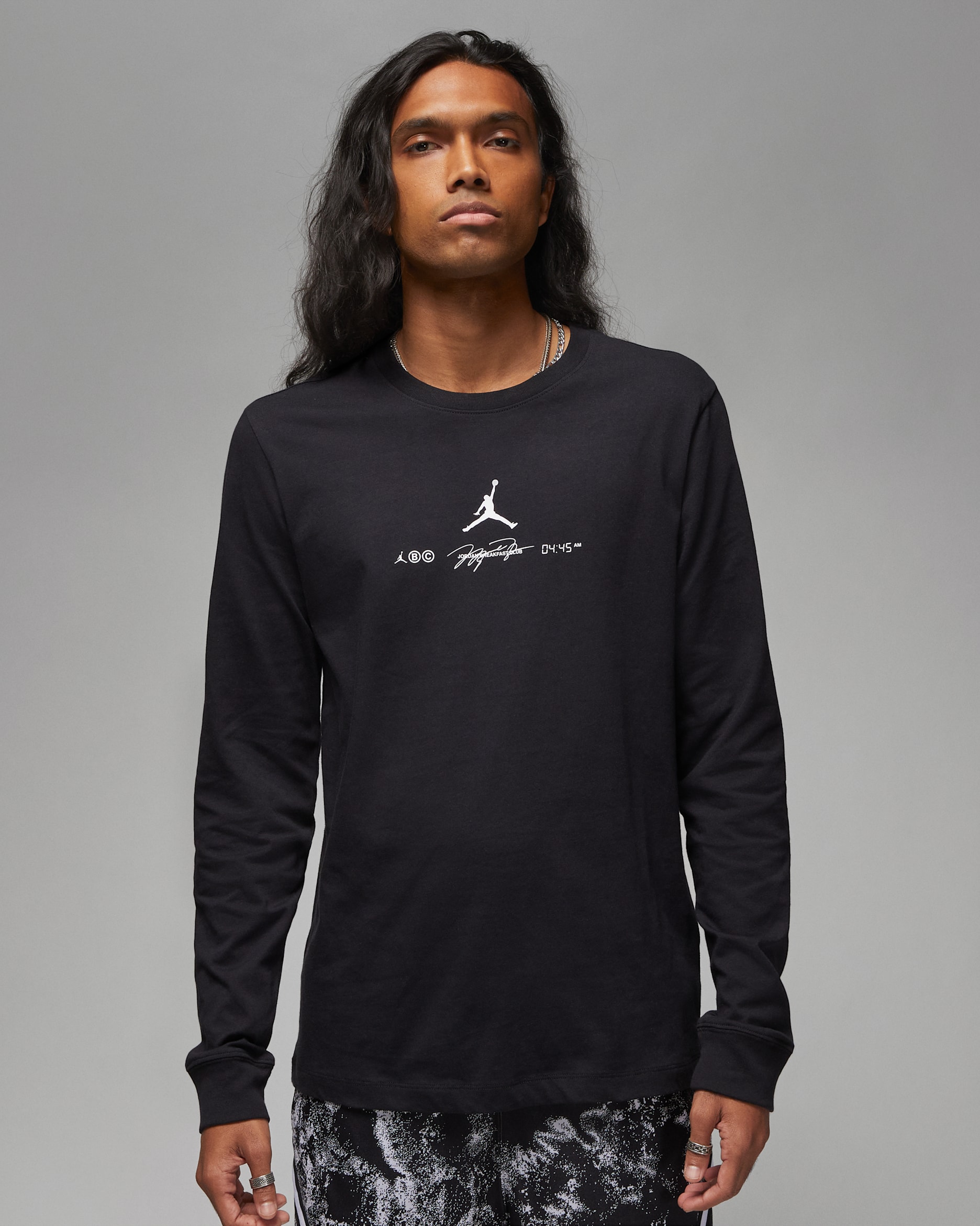 เสื้อยืดแขนยาวผู้ชายมีกราฟิก Jordan Dri-FIT Sport - ดำ/ขาว