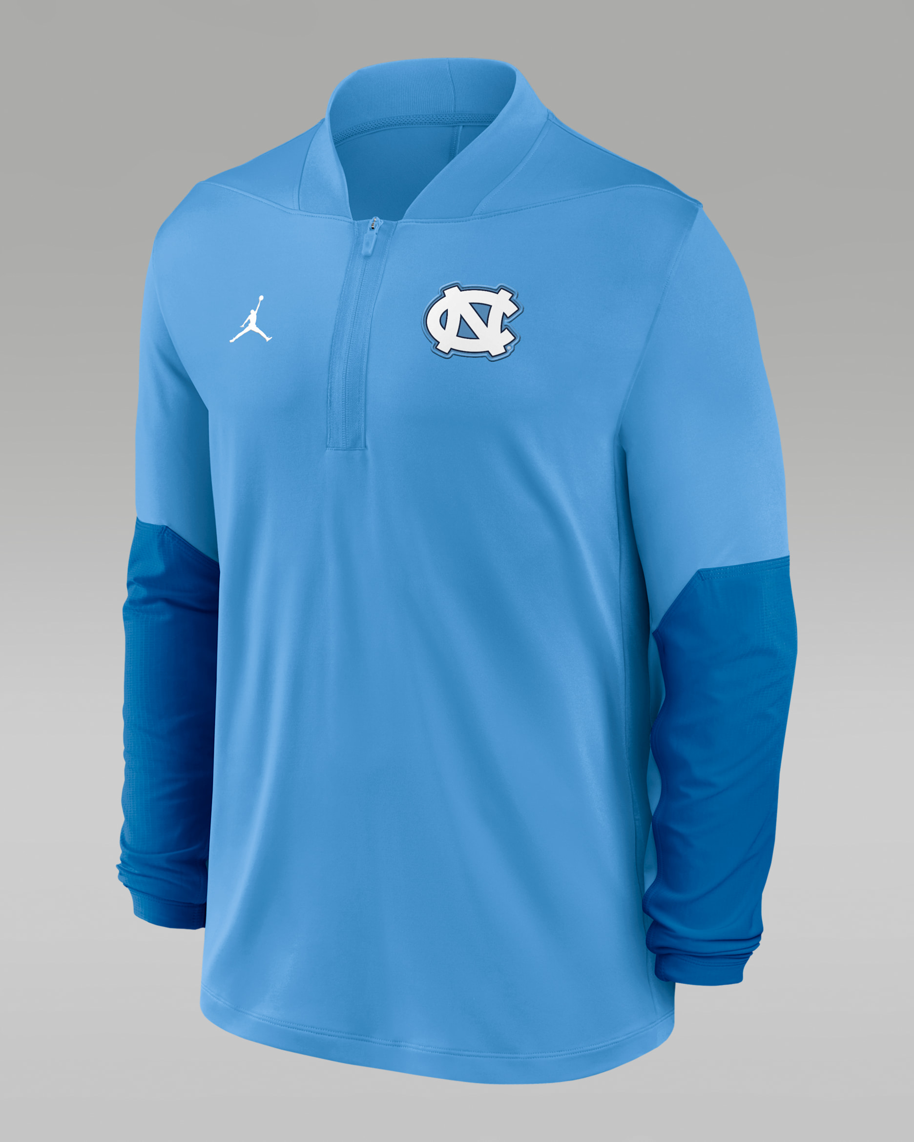 Playera universitaria marca Jordan Dri-FIT de medio cierre para hombre North Carolina - Azul claro