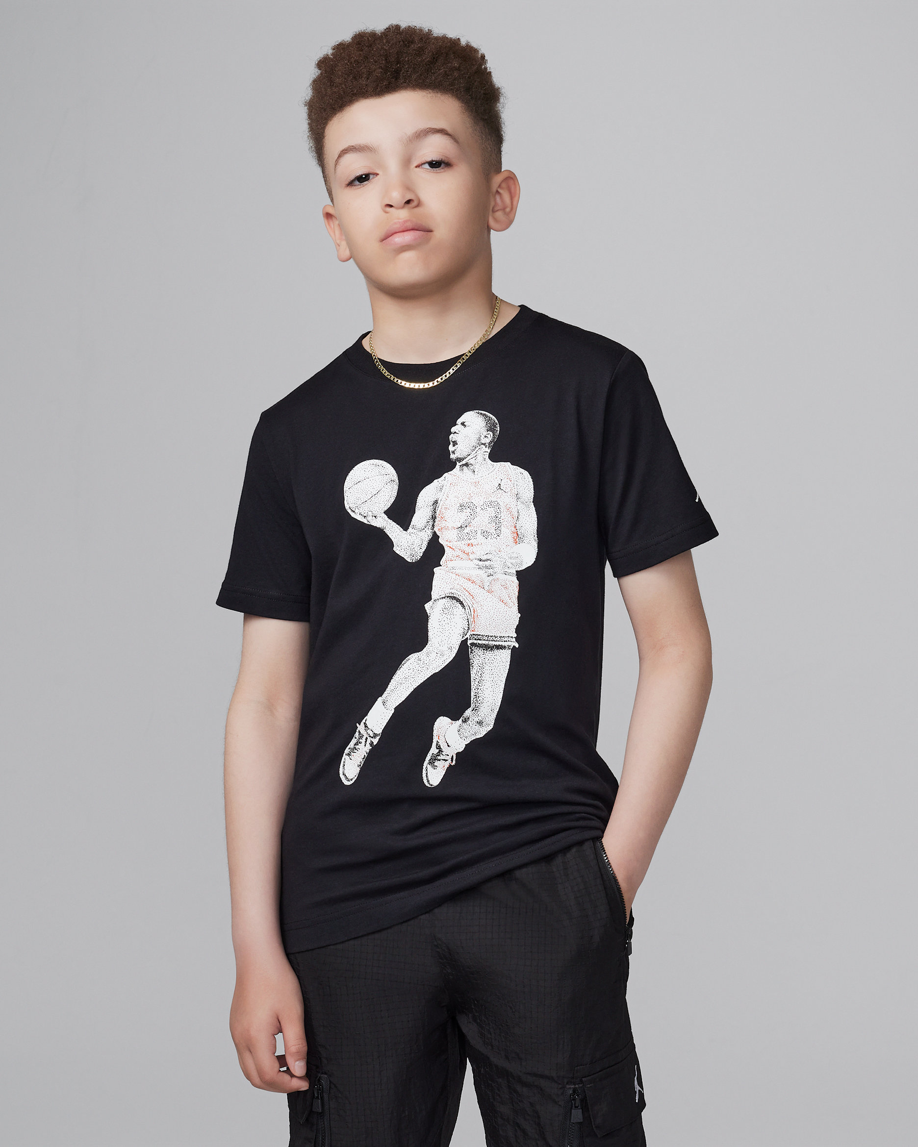 Air Jordan-T-shirt med prikgrafik til større børn - sort