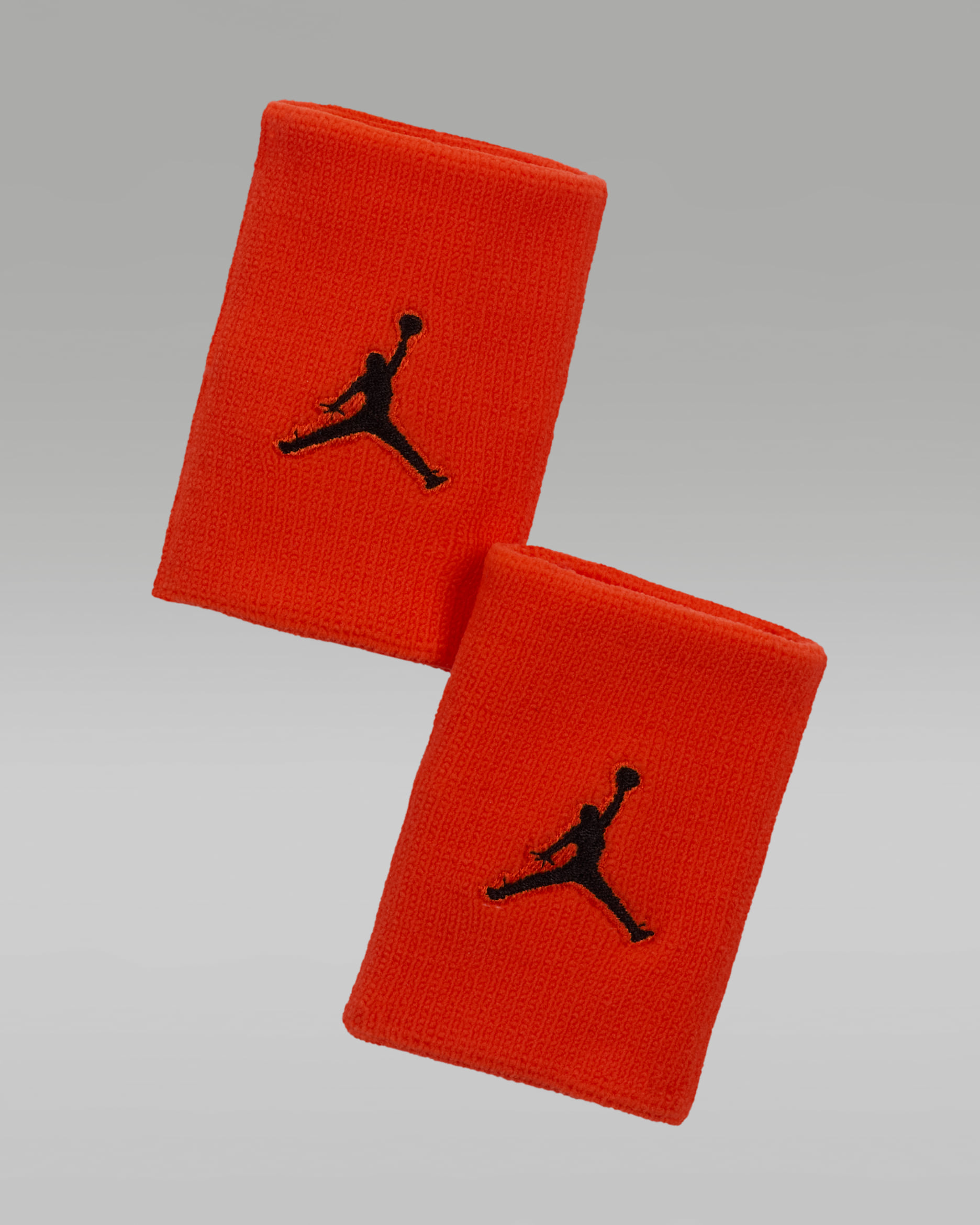Muñequeras Jordan Jumpman - Naranja team