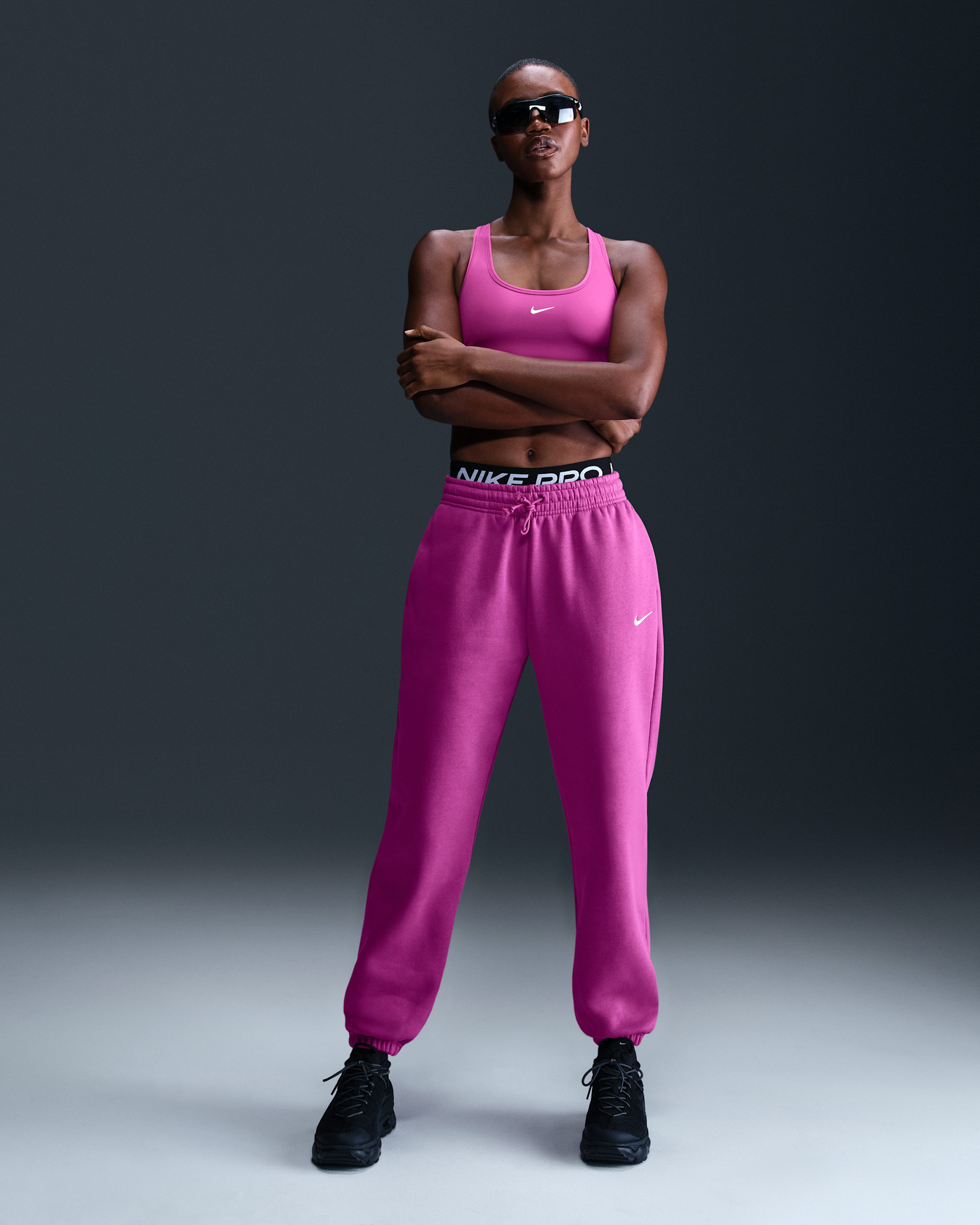 Pants de entrenamiento oversized de tiro alto para mujer Nike Sportswear Phoenix Fleece - Fucsia cálido/Vela