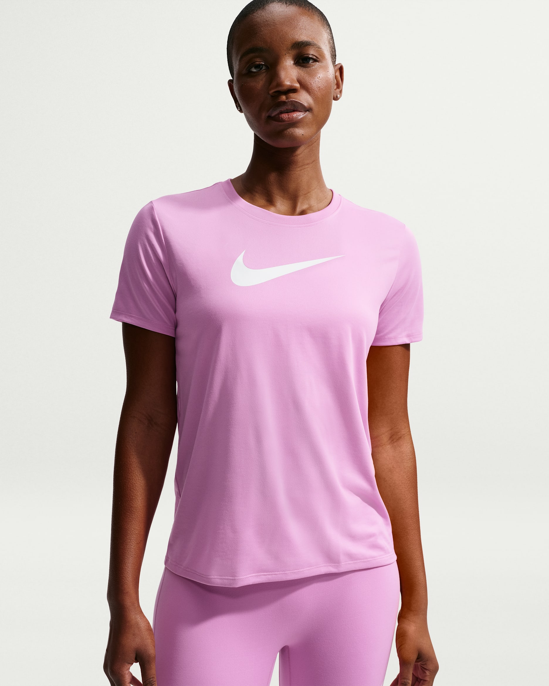 Playera con gráfico Dri-FIT para mujer Nike - Magenta claro/Blanco