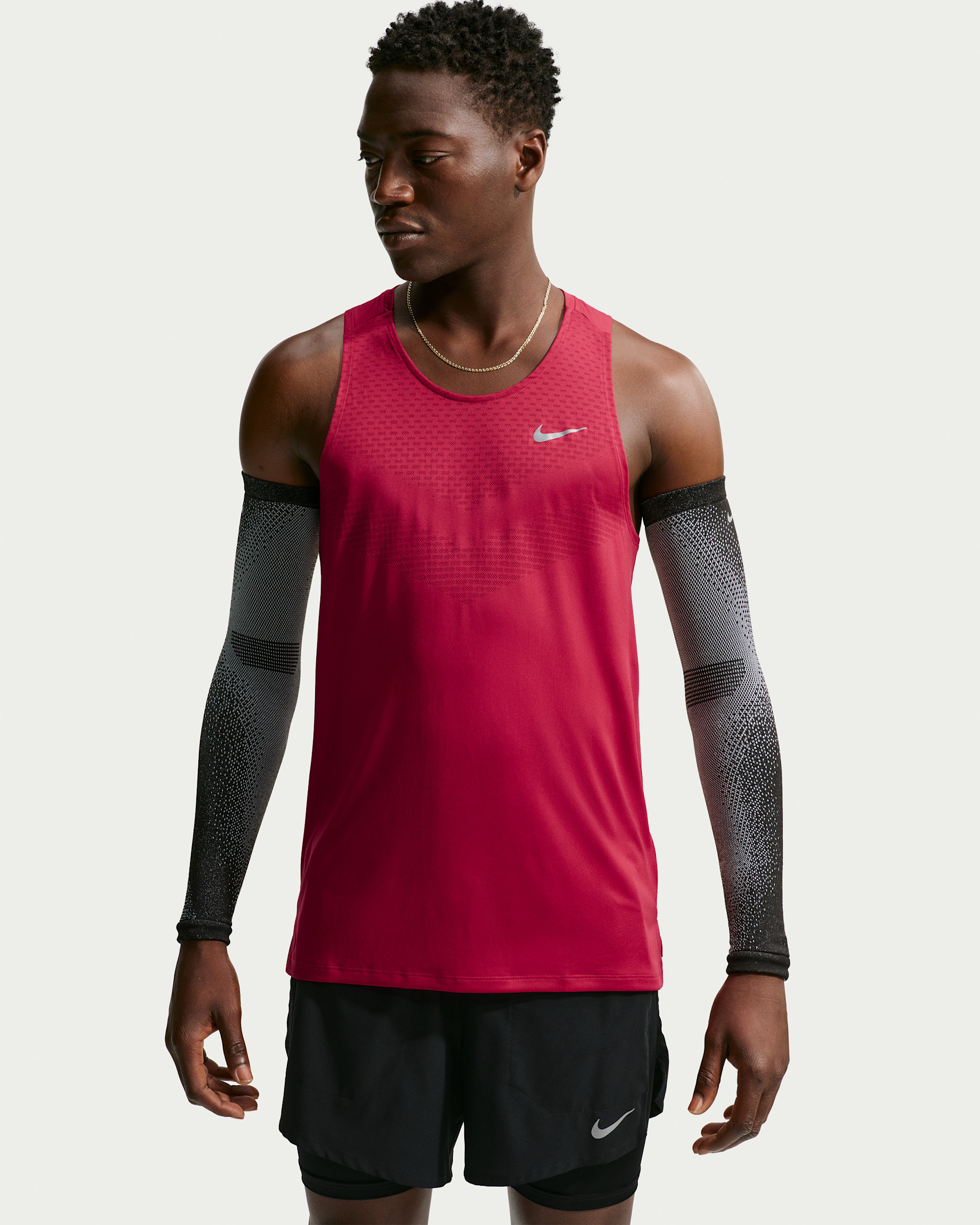 Nike Stride Dri-FIT ADV-løbetanktop til mænd - Tough Red