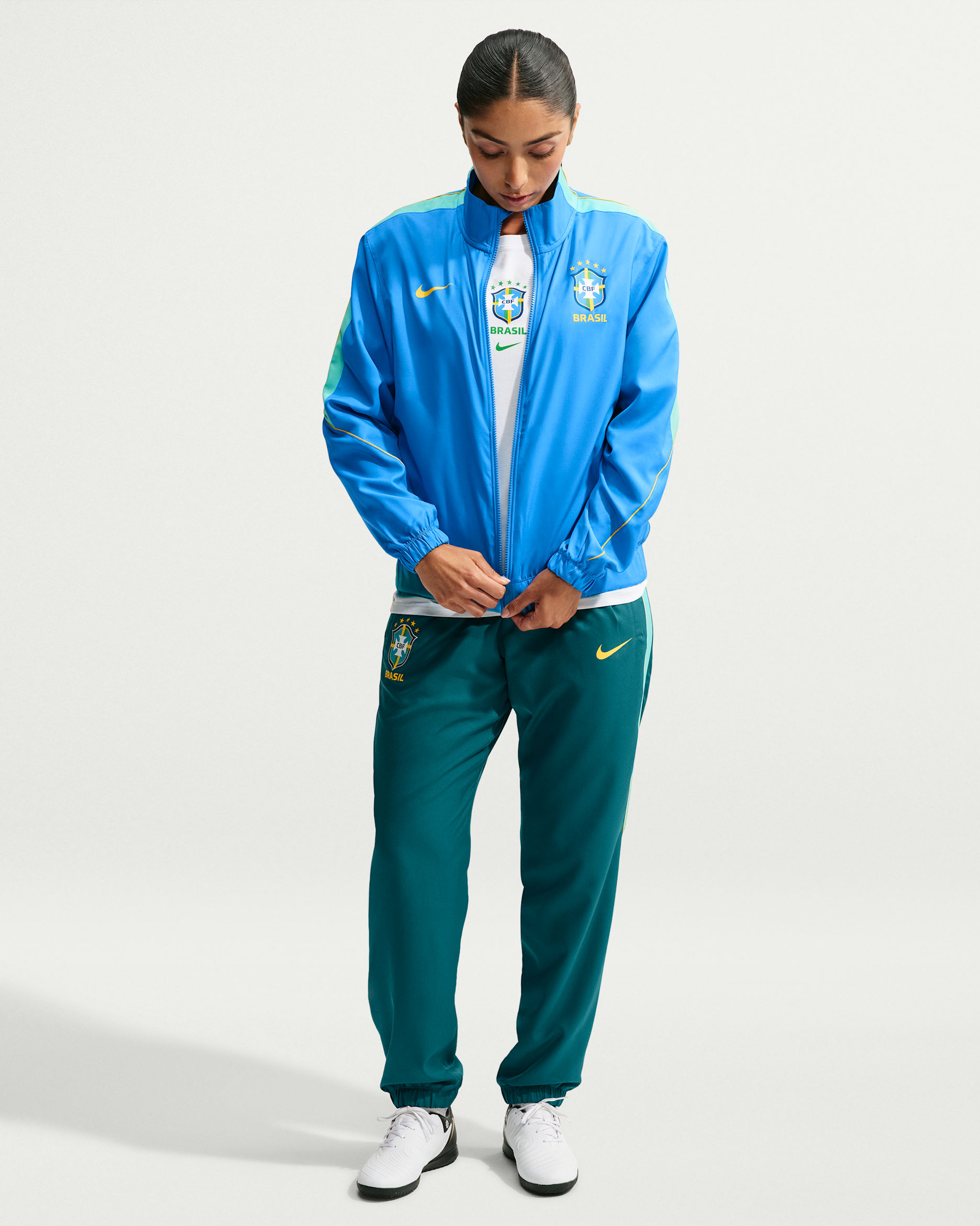 Brazil Strike Women's Nike Dri-FIT Soccer Woven Tracksuit - Light Photo Blue/Geode Teal/Light Menta/Midwest Gold