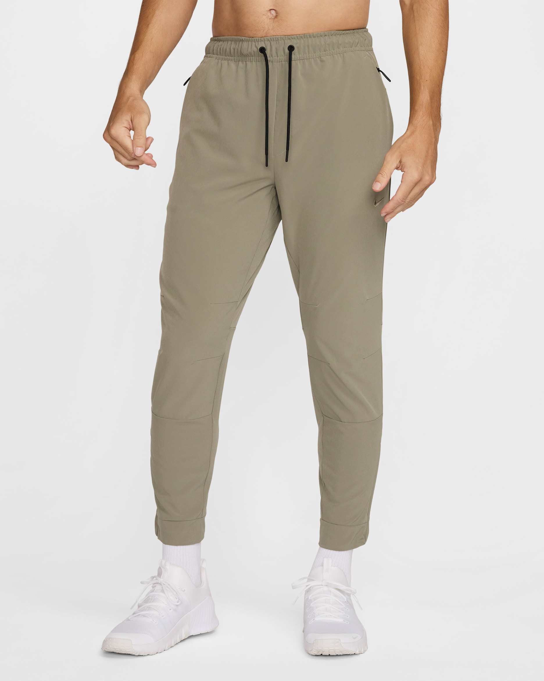 Calças versáteis com punho com fecho Dri-FIT Nike Unlimited para homem - Light Army/Preto/Light Army
