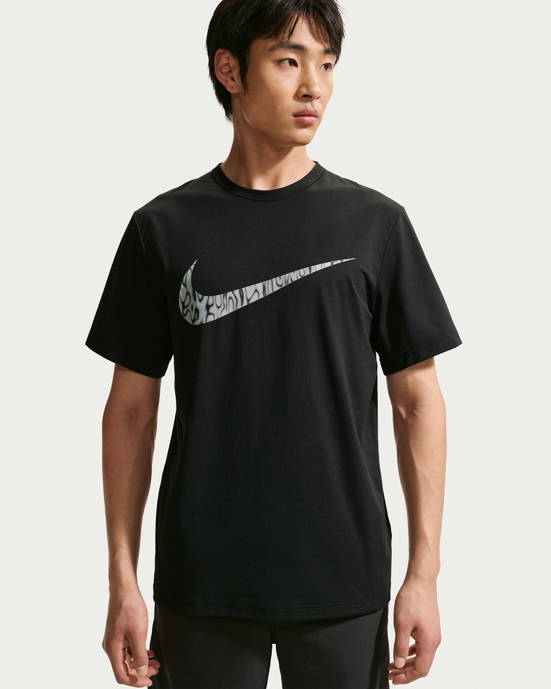 เสื้อยืดเทรนนิ่งป้องกัน UV ผู้ชาย Dri-FIT Nike Hyverse - ดำ