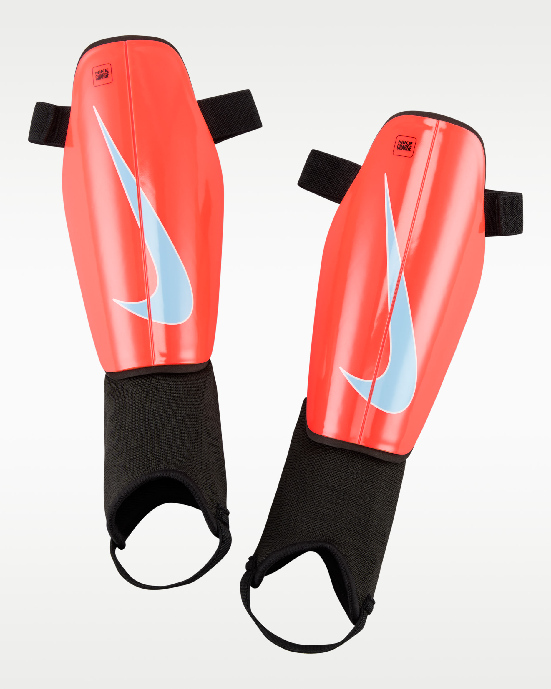 Espinillera de fútbol Nike Charge - Carmesí brillante/Negro/Tinte royal