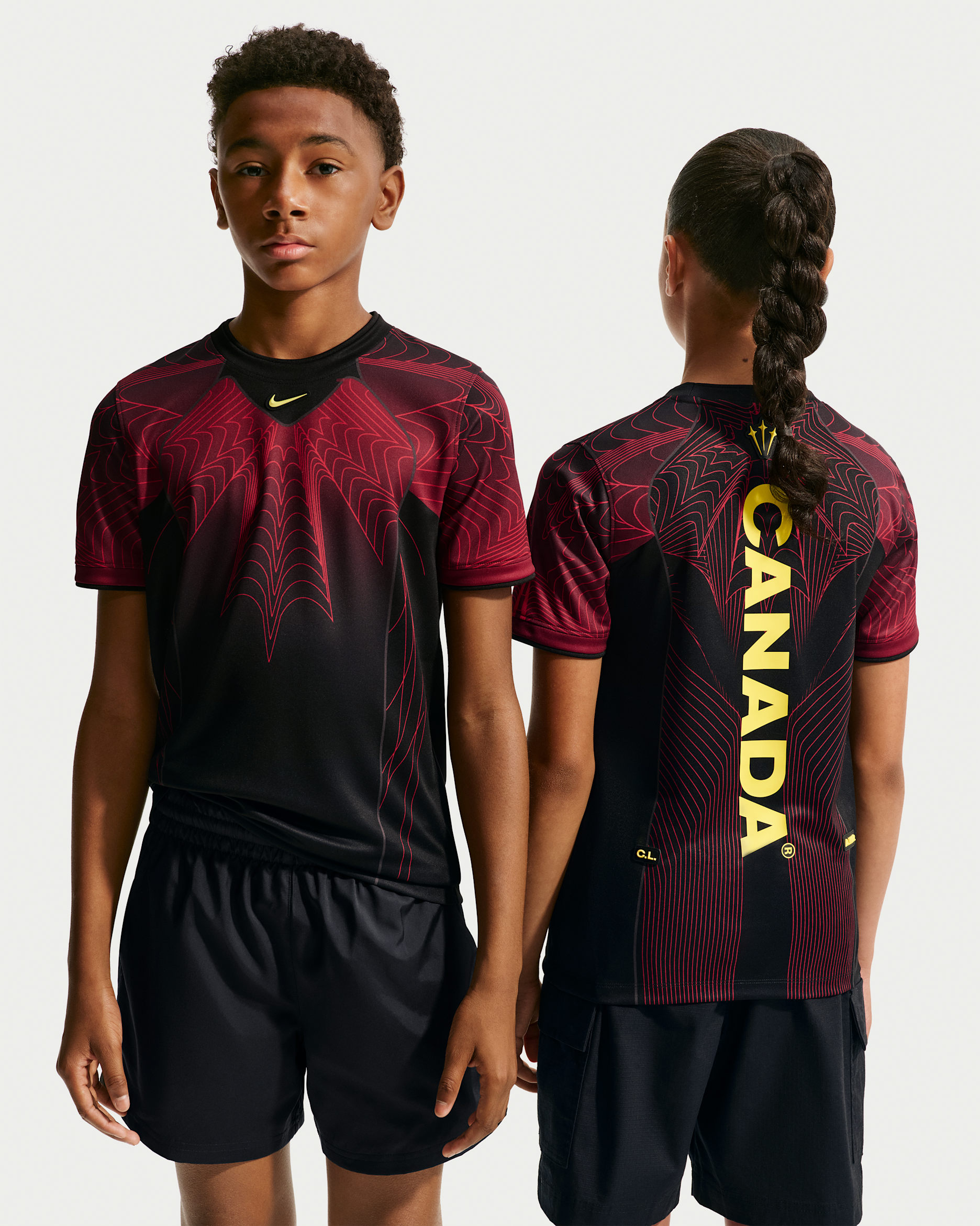 Canada Big Kids' Nike Dri-FIT Soccer Pre-Match Short-Sleeve Top - Black/University Red/Sonic Yellow