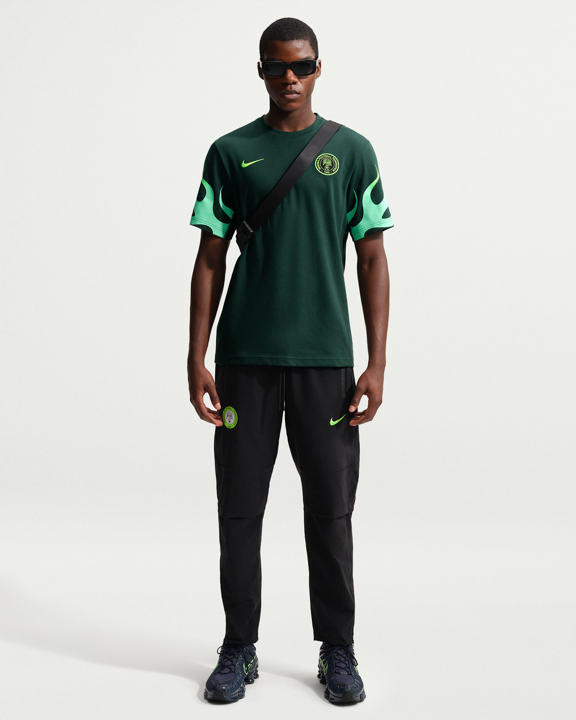 Nigeria Tech Men's Nike Football Woven Pants - Black/Electric Green