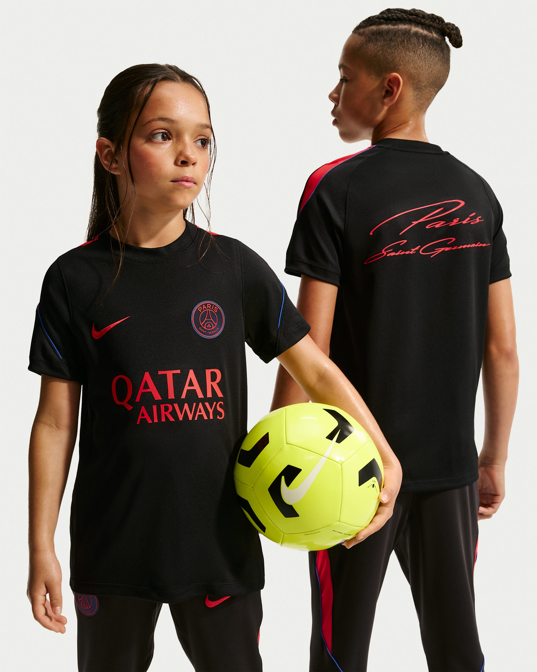 Paris Saint-Germain Strike Older Kids' Nike Football Dri-FIT Short-Sleeve Top - Black/Hyper Royal/Global Red/Global Red