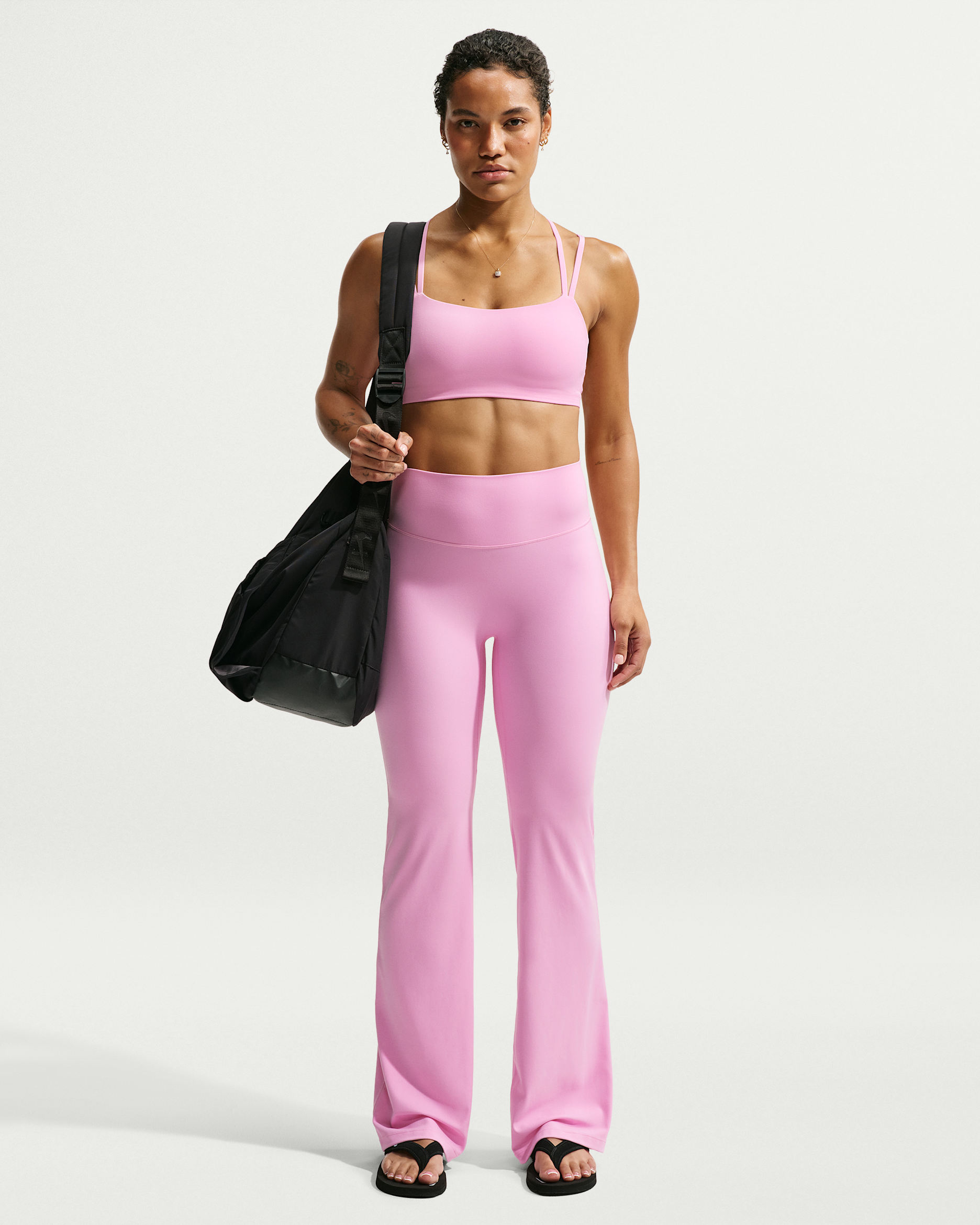 Leggings acampanados de tiro alto sin costura delantera para mujer Nike Zenvy - Rosa amanecer/Gris azulado