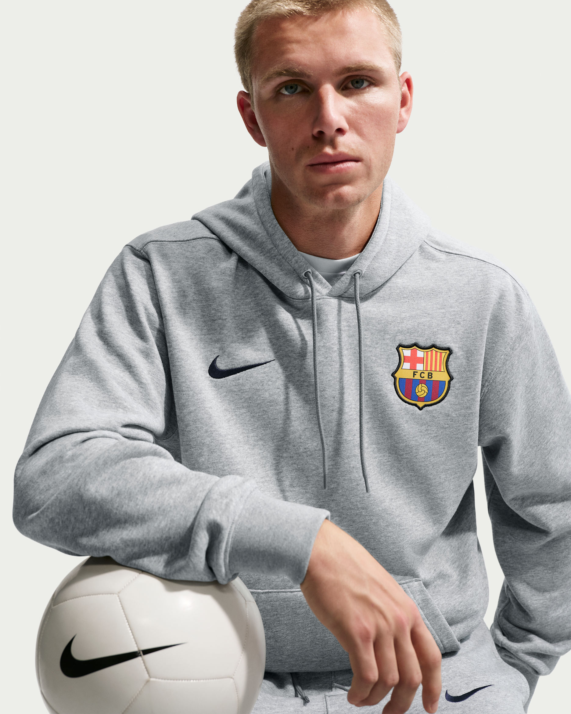 FC Barcelona Club Men's Nike Soccer French Terry Pullover Hoodie - Dark Grey Heather/Blackened Blue