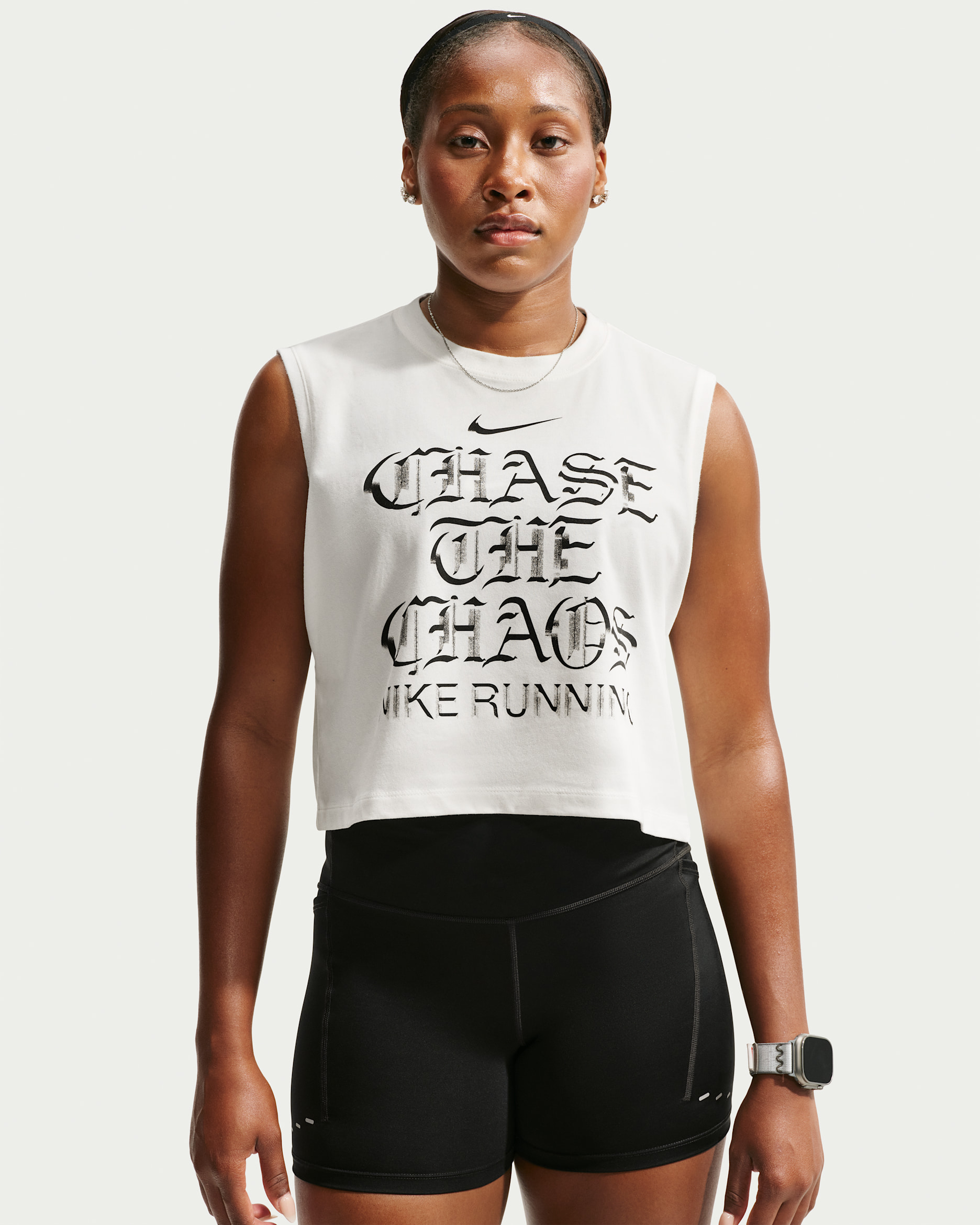 Playera de correr sin mangas Dri-FIT para mujer Nike - Vela/Negro