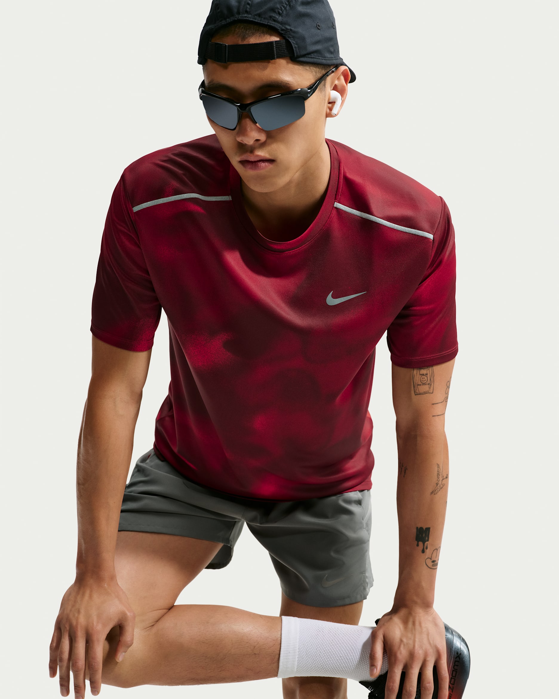 Nike Miler Dri-FIT kortermet løpeoverdel til herre - Light Crimson