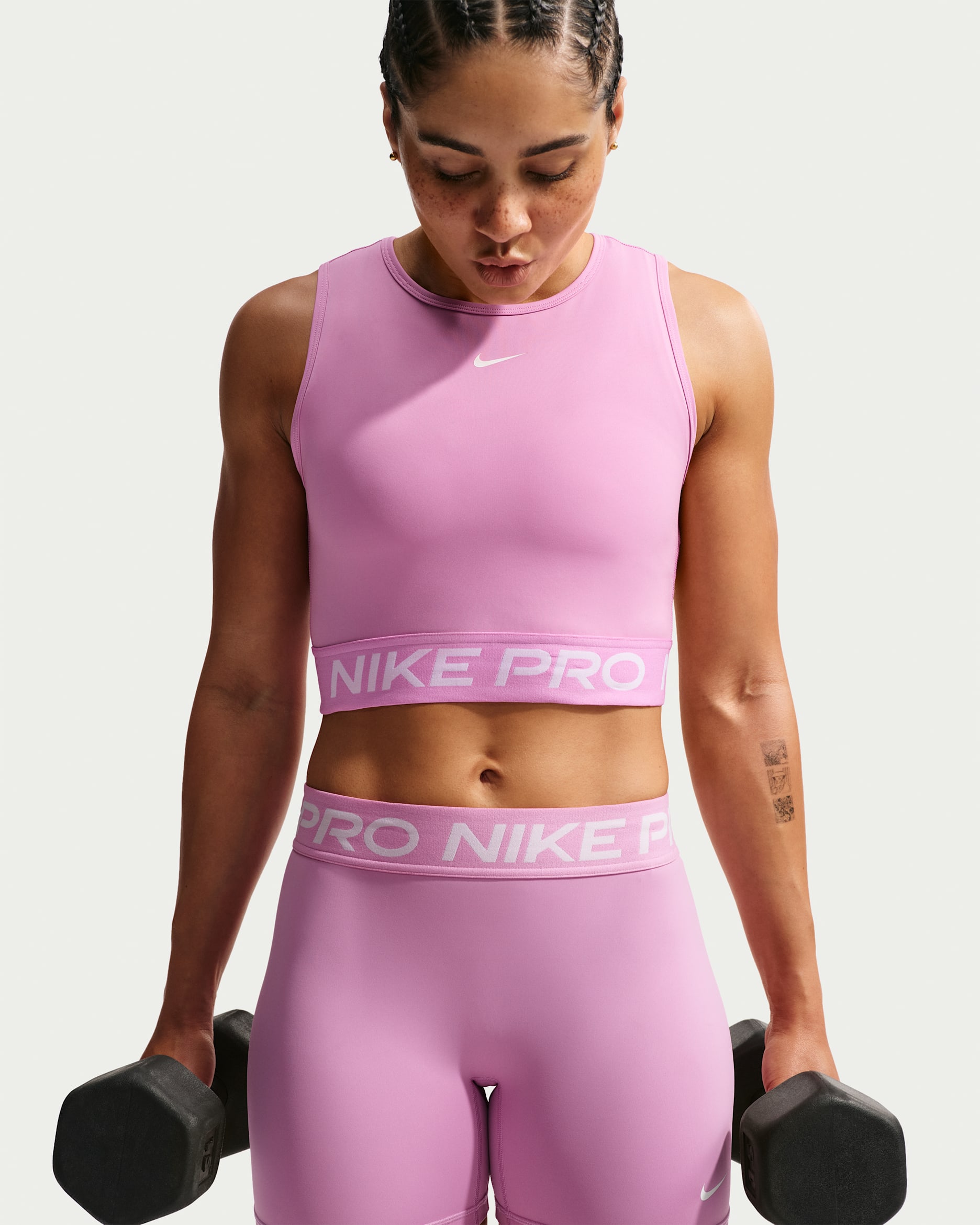Camiseta de tirantes Dri-FIT cropped para mujer Nike Pro - Magenta claro/Blanco