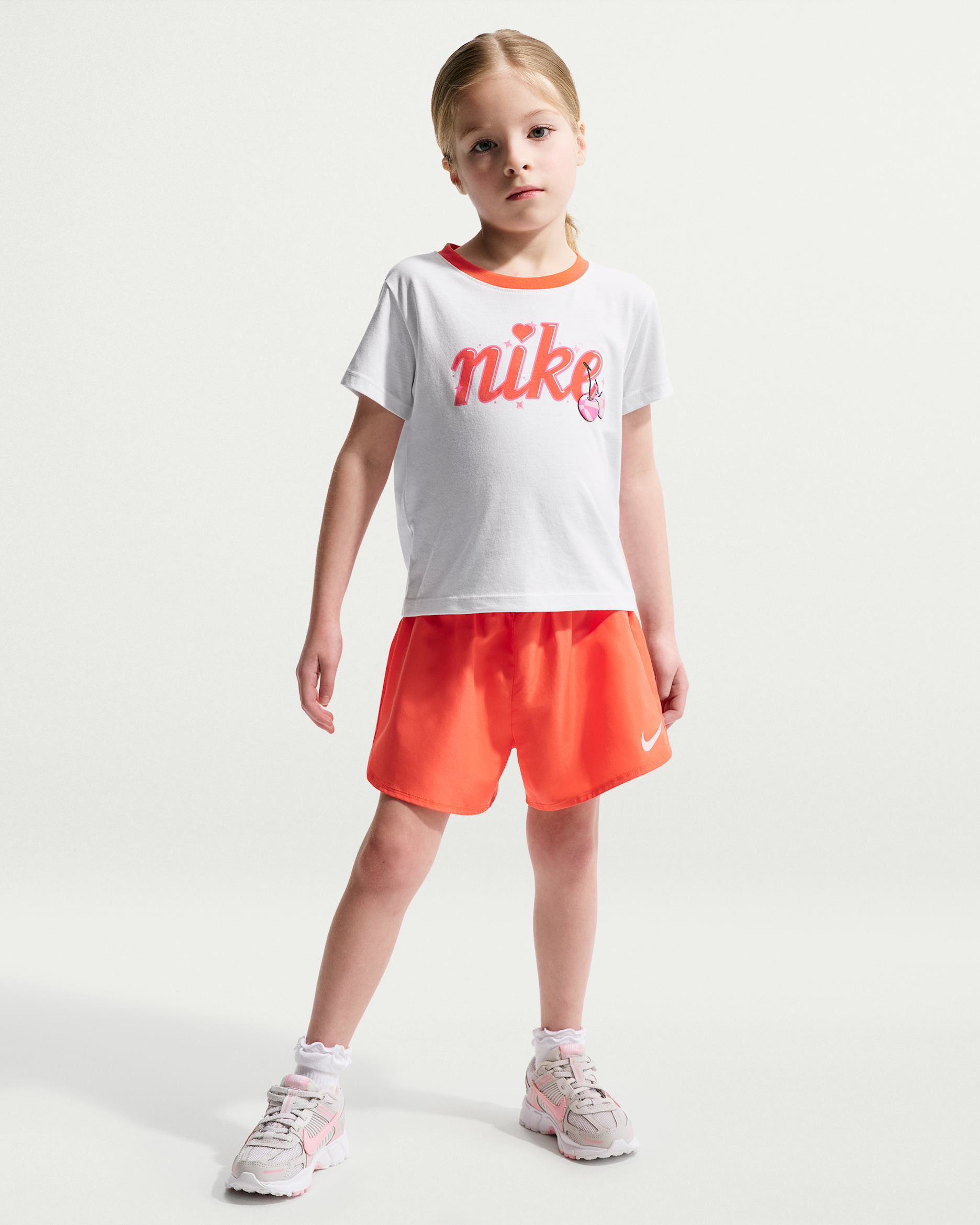 Conjunto de playera y shorts Crossover Dri-FIT para niños talla pequeña Nike - Naranja césped