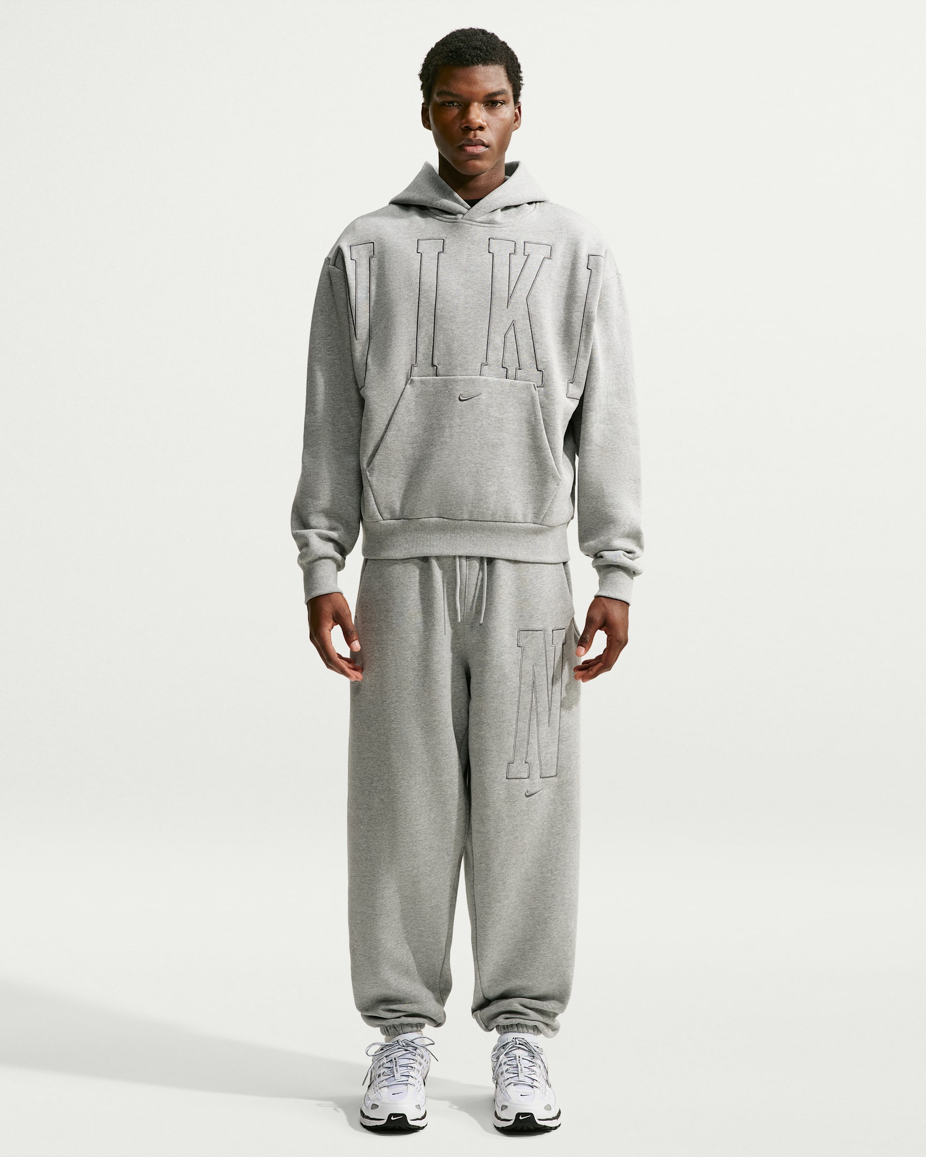 Nike Solo Fleece Men's Loose Cuffed Trousers - Dark Grey Heather/Smoke Grey