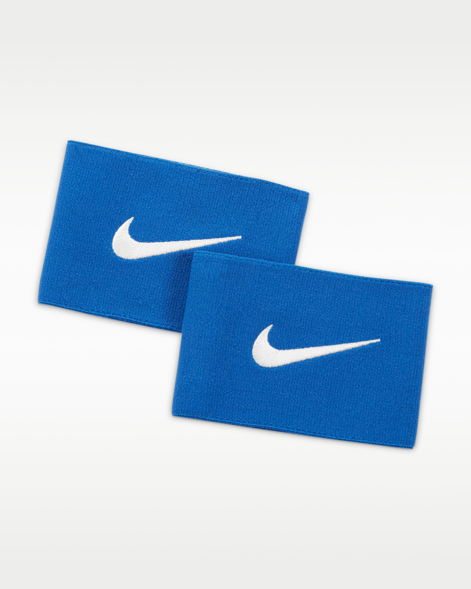 Fotbalový návlek Nike Guard Stay 2 - Varsity Royal/Bílá
