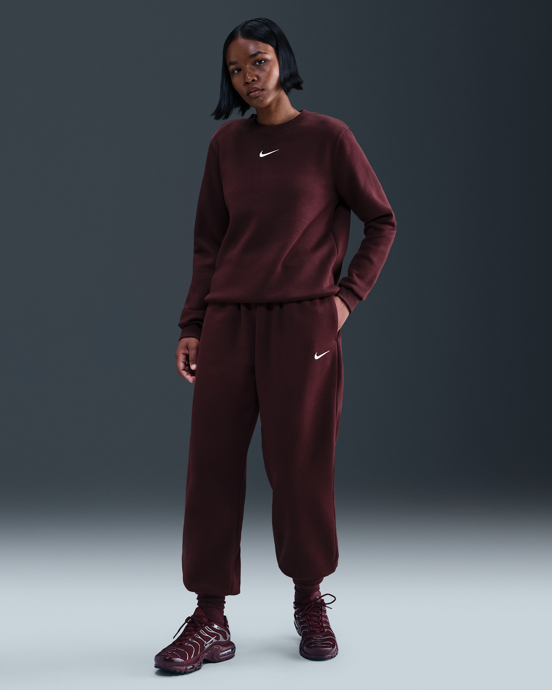 Pants de entrenamiento oversized de tiro alto para mujer Nike Sportswear Phoenix Fleece - Burdeos enérgico/Vela